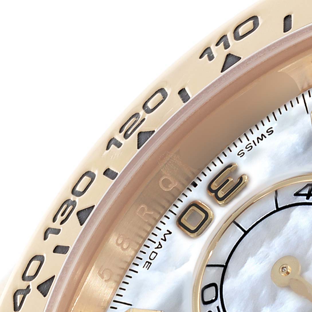 The image shows a close-up of the Rolex Daytona 116508 Men's Yellow Gold Mother of Pearl Dial 116508 Men's Yellow Gold Mother of Pearl Dial's bezel and part of the dial with numerals and "SWISS" text.