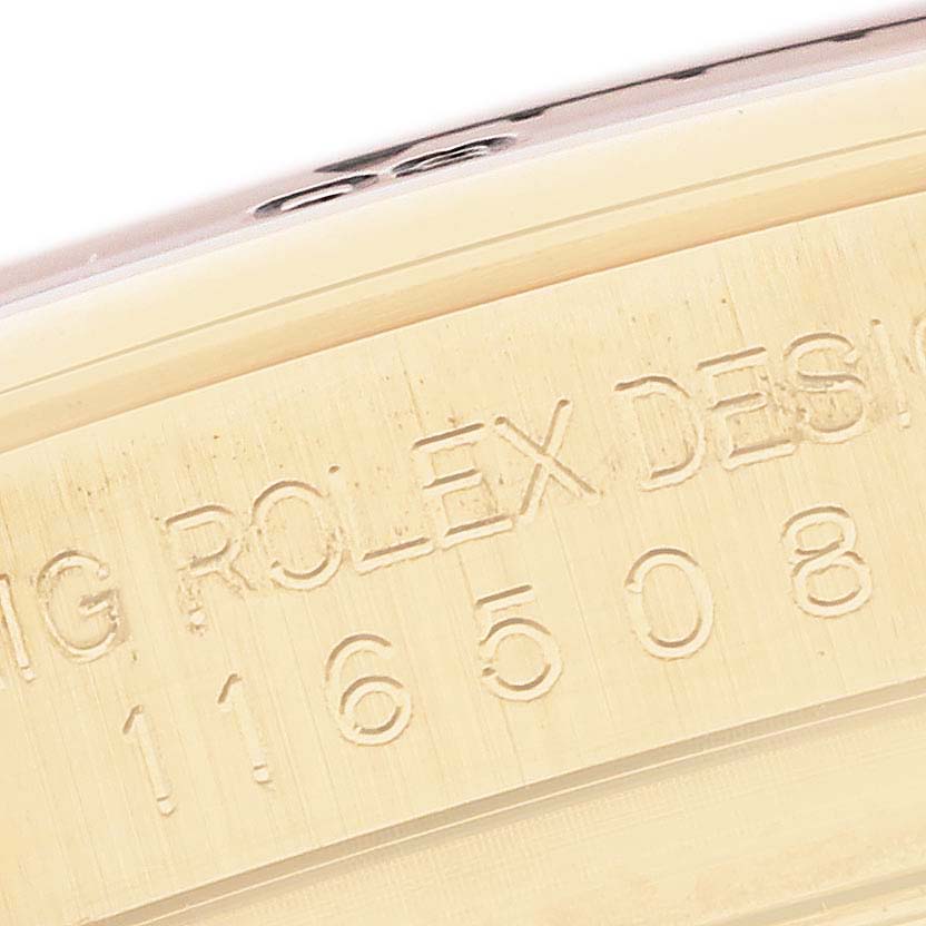 The image shows a detailed close-up of the engraving on the side of a Rolex Daytona 116508 Men's Yellow Gold Mother of Pearl Dial 116508 Men's Yellow Gold Mother of Pearl Dial watch case.