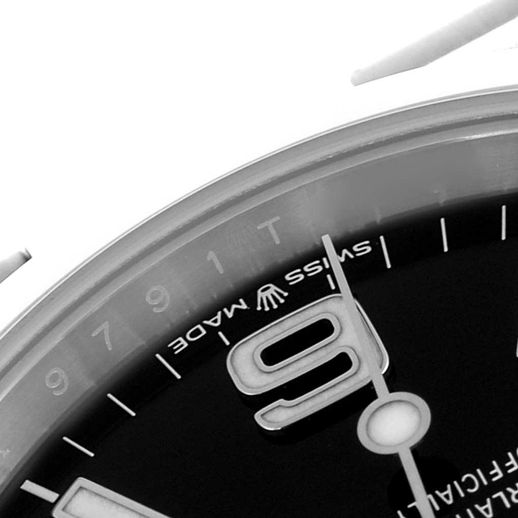 The image shows a close-up angle of the Rolex Explorer 224270 Men's Stainless Steel Black Dial 224270 Men's Stainless Steel Black Dial watch dial, highlighting the "9" marker and "Swiss Made" text.