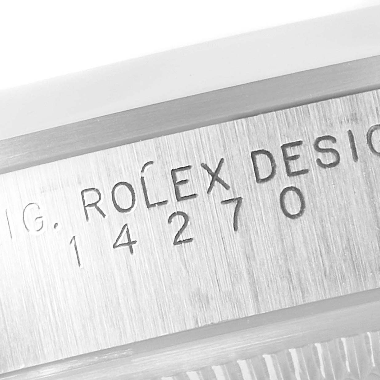 The image shows a close-up of the engraved model number and branding on the edge of a Rolex Explorer 14270 Men
s Stainless Steel Black Dial 14270 Men
s Stainless Steel Black Dial watch.