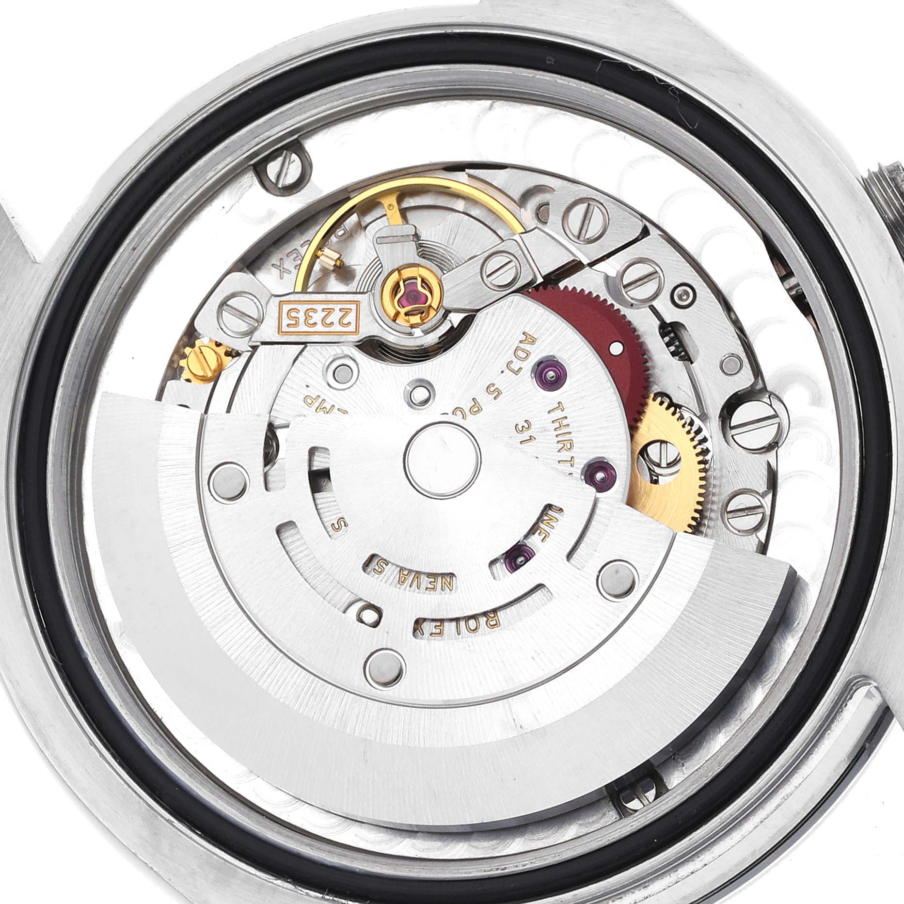 The image shows the movement mechanism of a mid-size Rolex watch from a top-down angle.