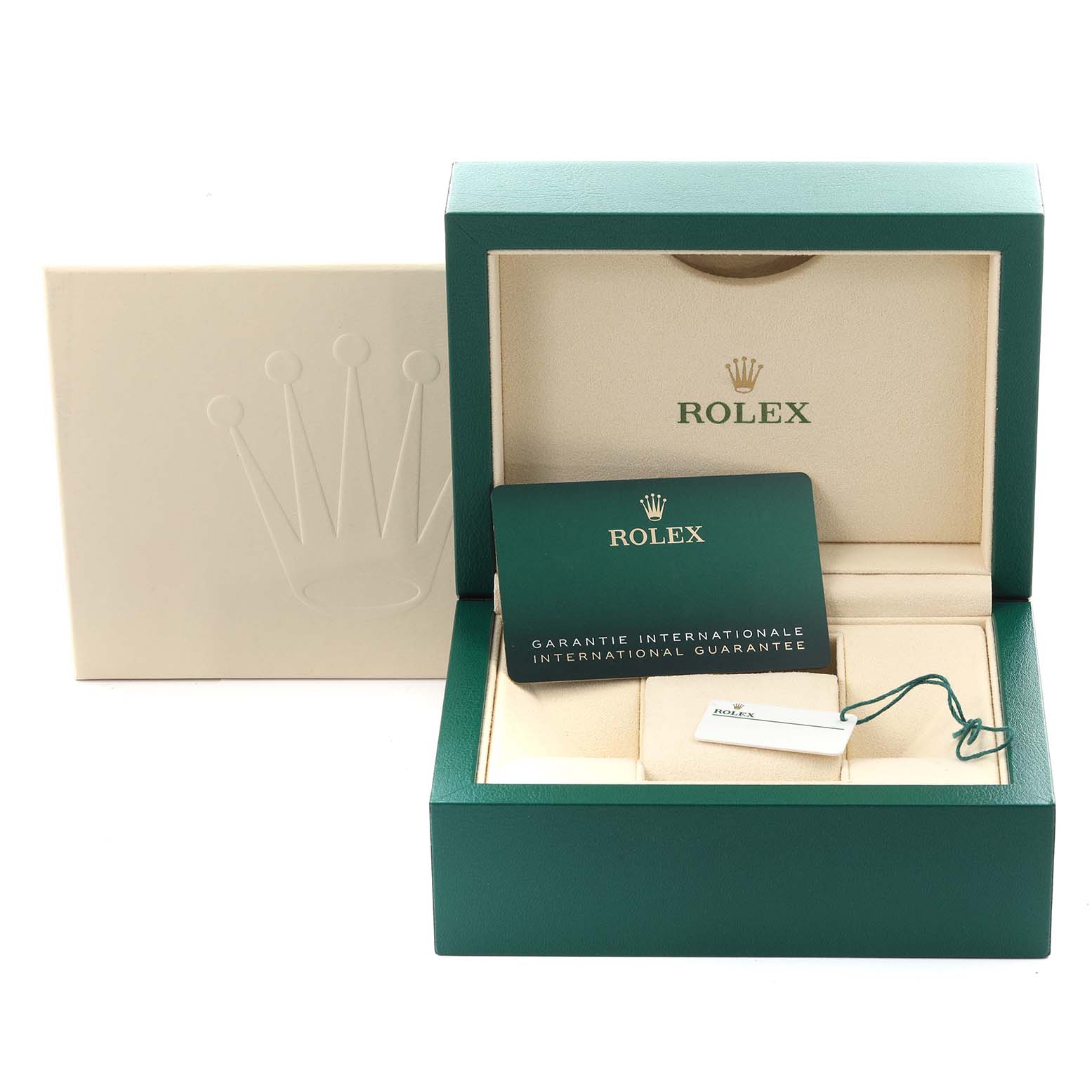 The Rolex Oyster Perpetual 124300 Men's Stainless Steel Silver Dial 124300 Men's Stainless Steel Silver Dial accessories are shown in an open box with the guarantee card and tag visible.