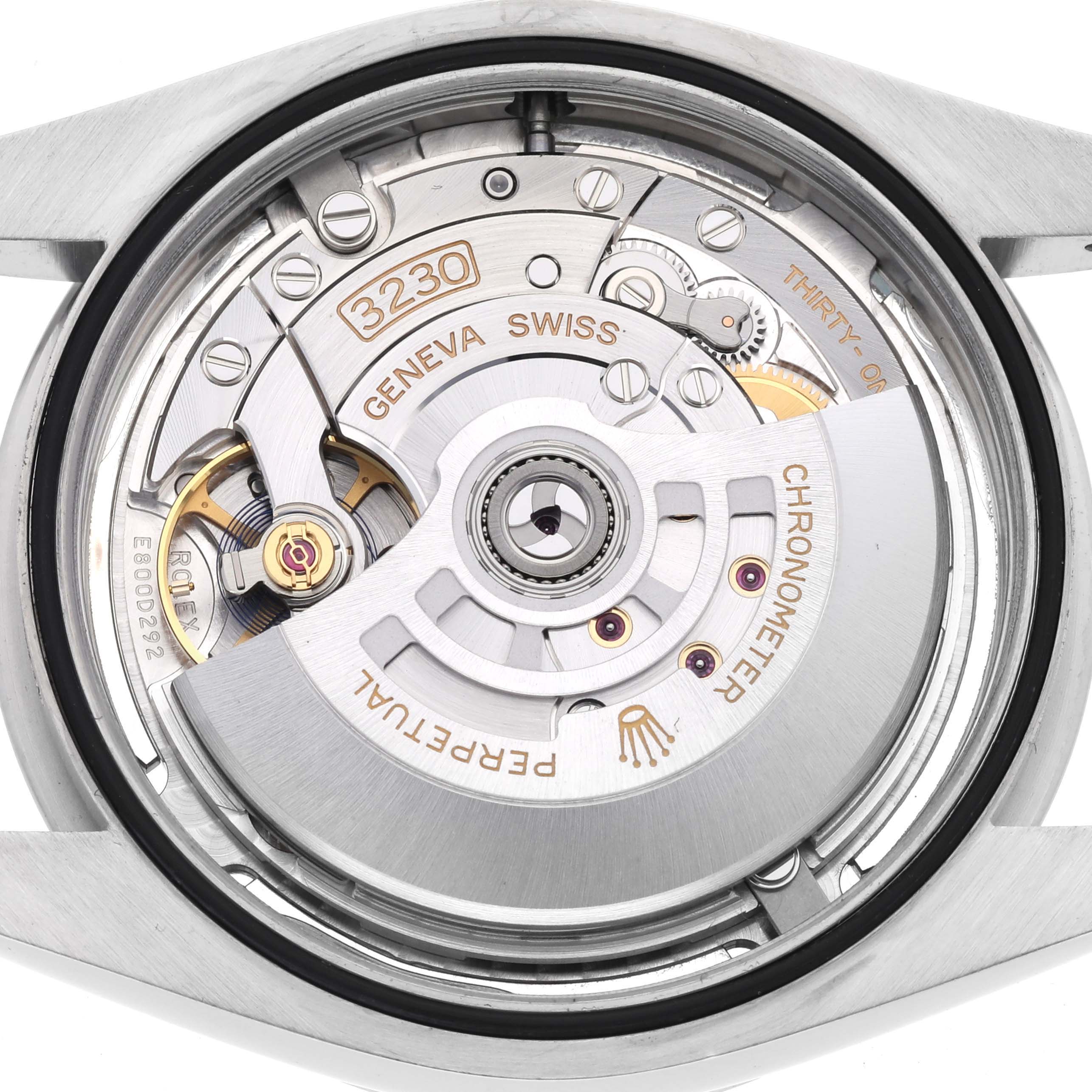 The image shows the movement mechanism of a Rolex Oyster Perpetual 124300 Men's Stainless Steel Silver Dial 124300 Men's Stainless Steel Silver Dial watch, highlighting the intricate inner components.
