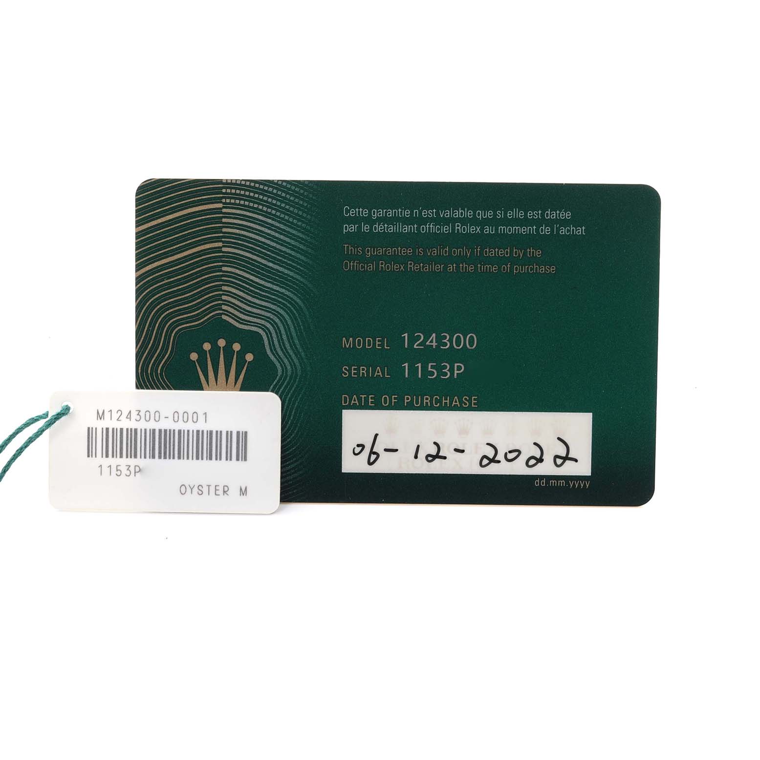 The image shows a Rolex Oyster Perpetual 124300 Men's Stainless Steel Silver Dial 124300 Men's Stainless Steel Silver Dial guarantee card and tag, with model 124300 and serial 1153P visible.