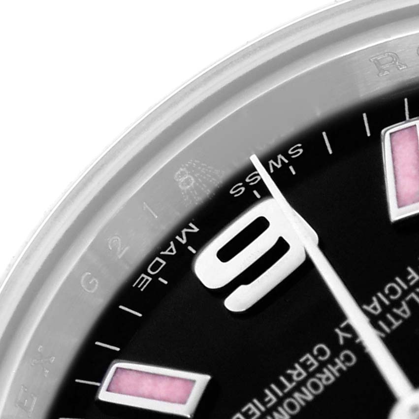 The image shows a close-up angle of the dial and bezel of the Rolex Oyster Perpetual 176200 Women's Stainless Steel Black Dial 176200 Women's Stainless Steel Black Dial, focusing on the numerals and hands.