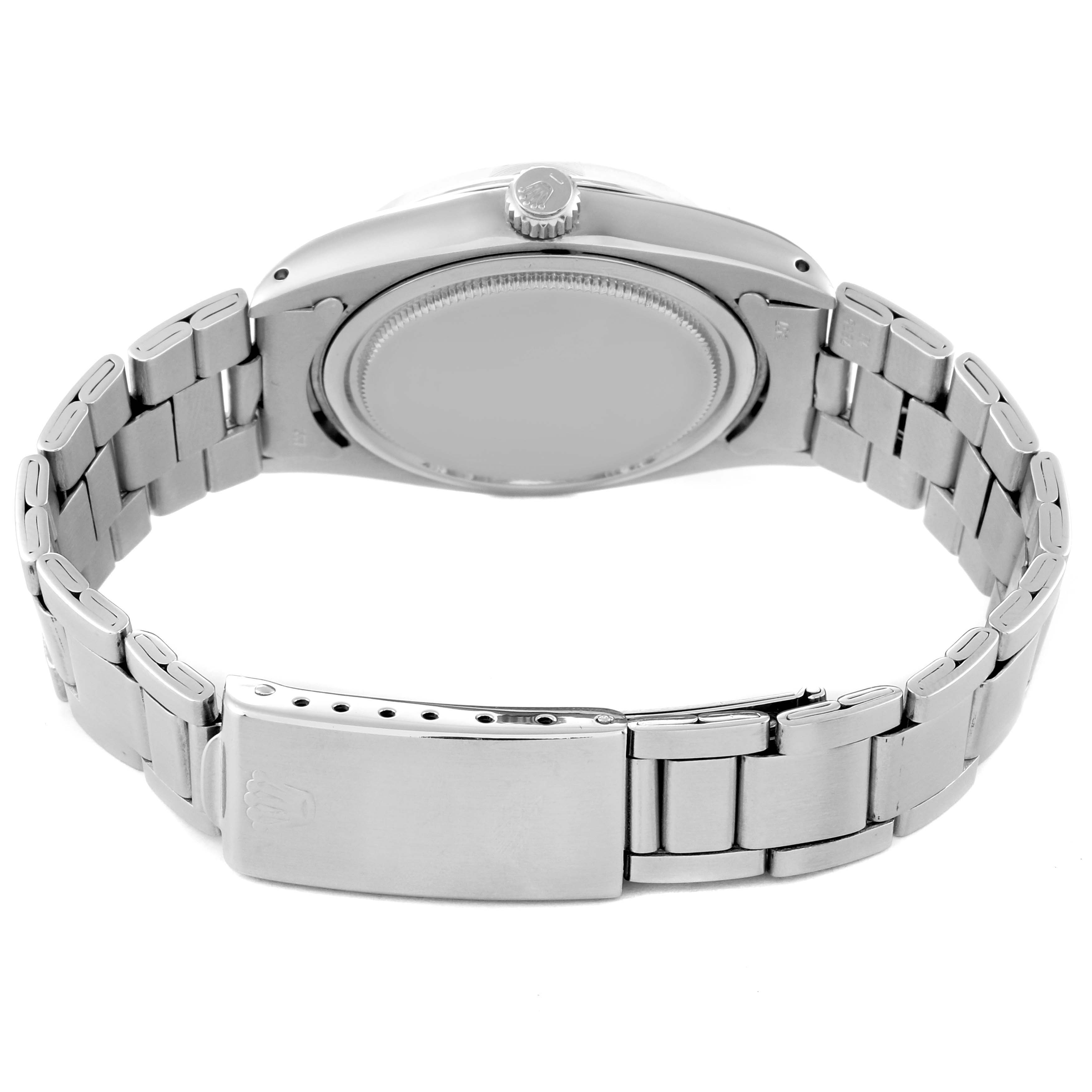 This image shows the back view of the Rolex Vintage Collection 6694 Men's Stainless Steel Black Dial 6694 Men's Stainless Steel Black Dial watch, focusing on the case back, bracelet, and clasp.