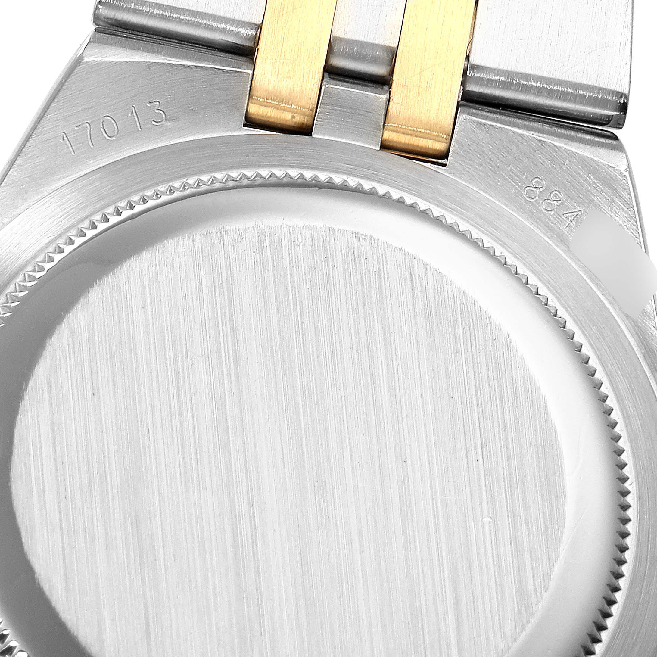 The image shows the case back and part of the bracelet of a Rolex Oysterquartz 17013 Men's Steel and Gold (two tone) Silver Dial 17013 Men's Steel and Gold (two tone) Silver Dial model watch.
