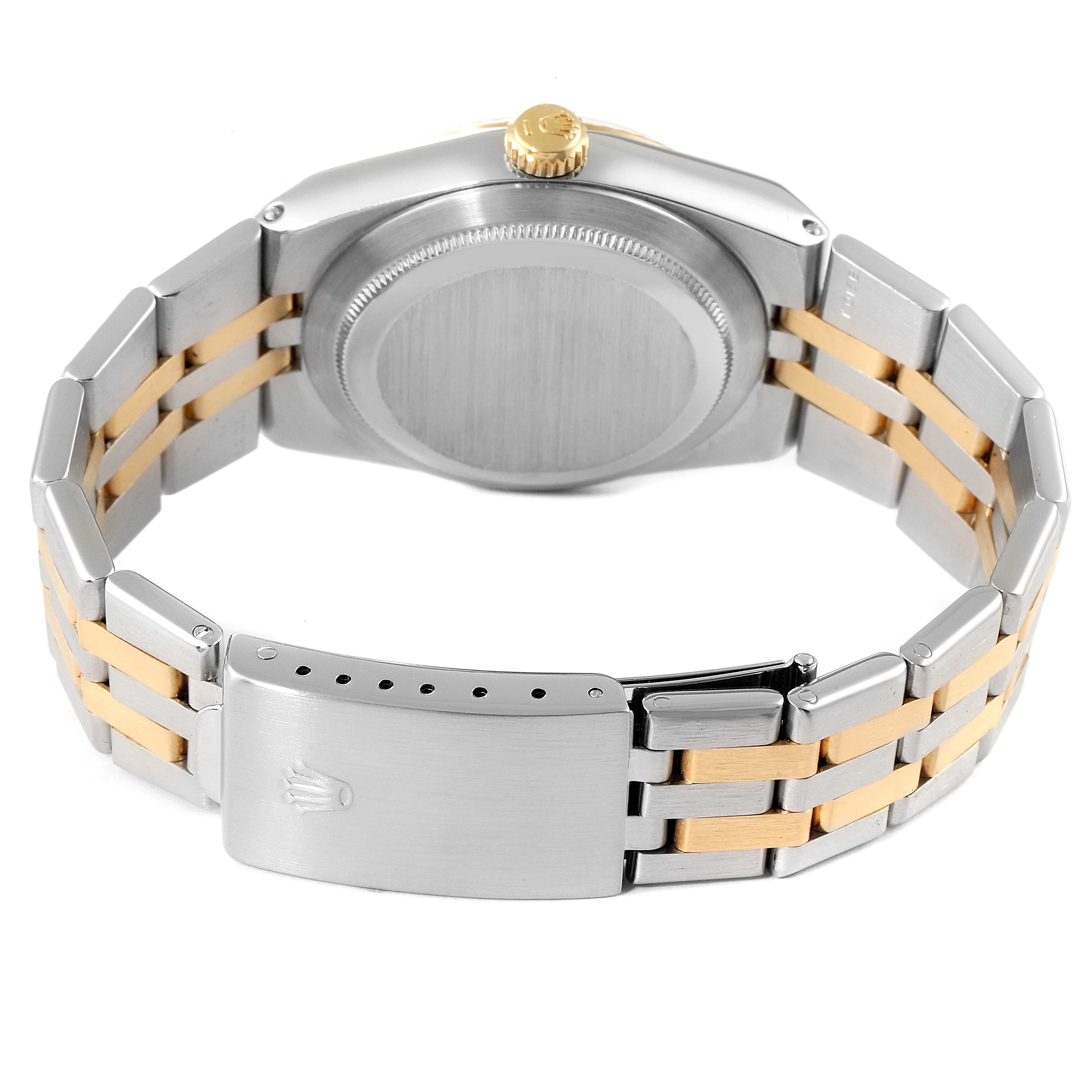 The image shows the back case and bracelet clasp of the Rolex Oysterquartz 17013 Men's Steel and Gold (two tone) Silver Dial 17013 Men's Steel and Gold (two tone) Silver Dial watch from a rear-top angle.