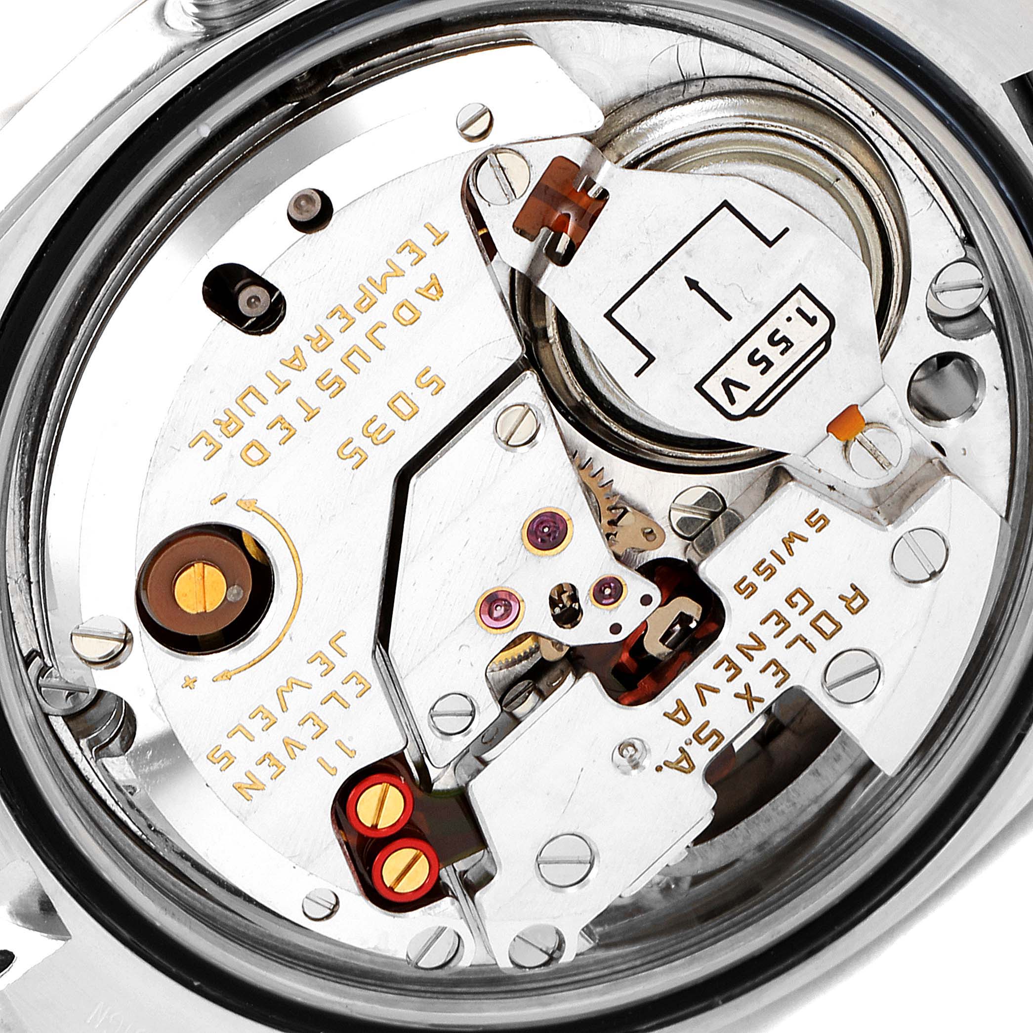 The image shows an inside view of the movement mechanism of a Rolex Oysterquartz 17013 Men's Steel and Gold (two tone) Champagne Dial 17013 Men's Steel and Gold (two tone) Champagne Dial watch.