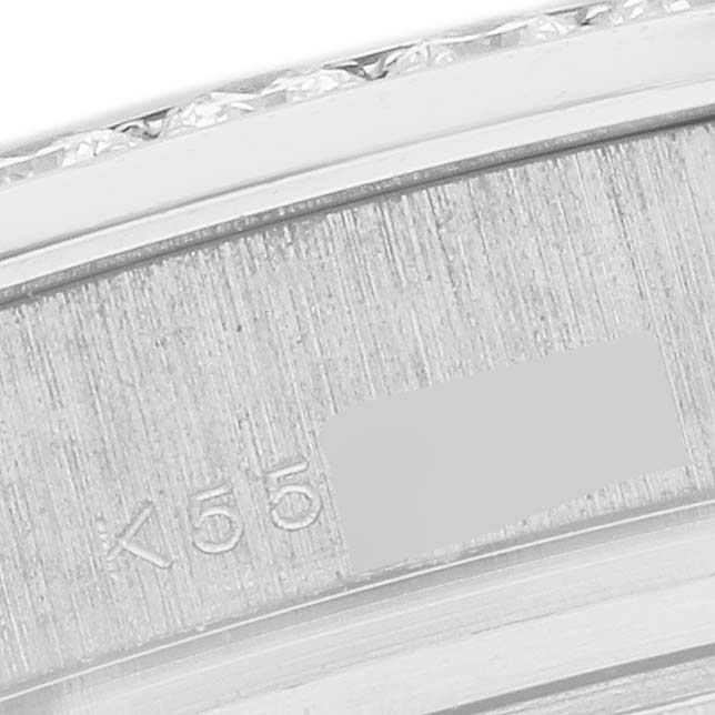 The image shows a close-up of the Rolex Pearlmaster 80299 Women's White Gold Mother of Pearl Dial 80299 Women's White Gold Mother of Pearl Dial watch, focusing on its engraved inner bezel and part of the diamond-set bezel.