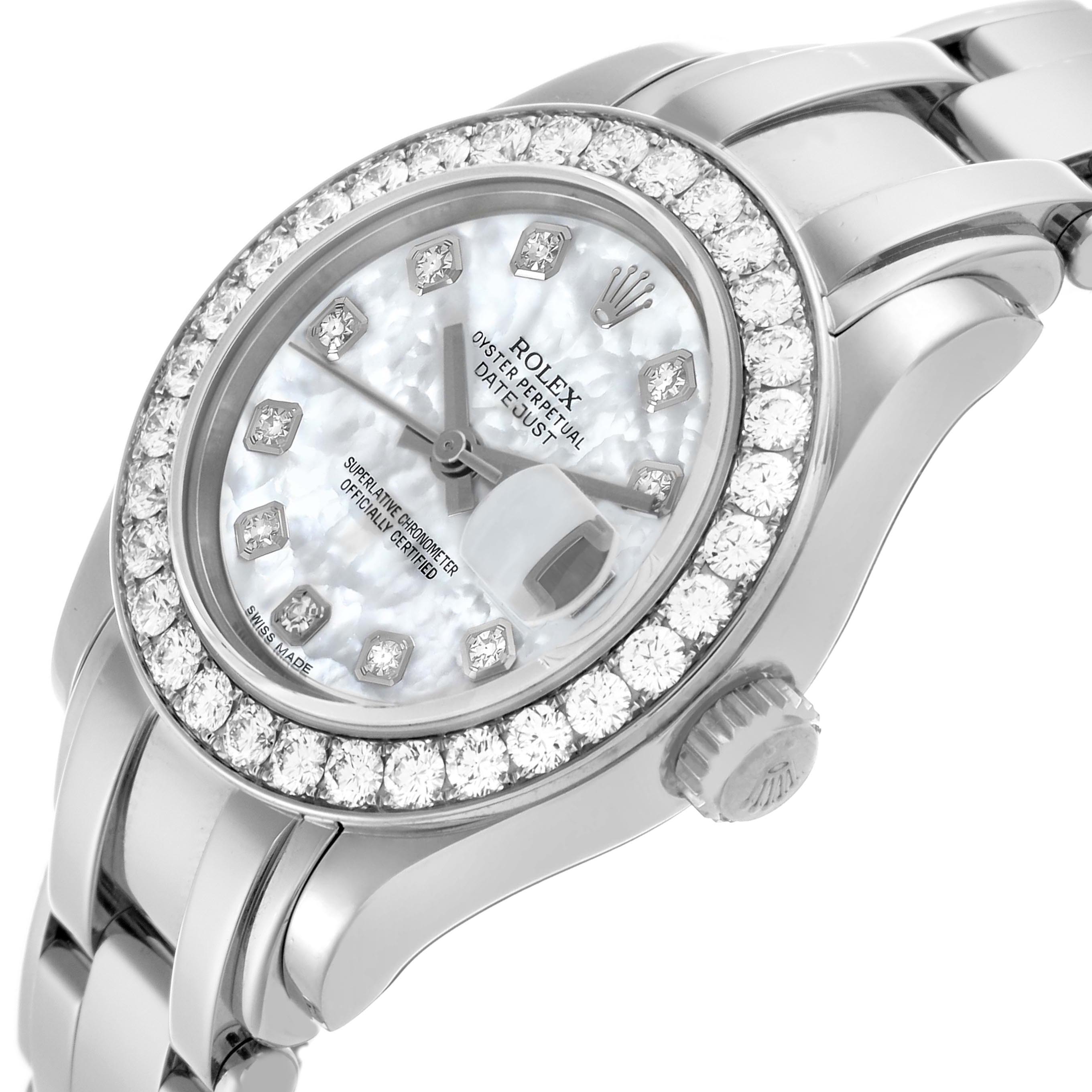 The Rolex Pearlmaster 80299 Women's White Gold Mother of Pearl Dial 80299 Women's White Gold Mother of Pearl Dial watch is shown at a tilted angle, highlighting its diamond bezel, mother-of-pearl dial, and bracelet.