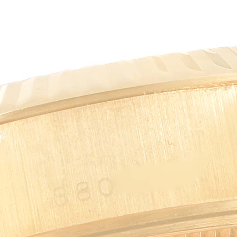 This close-up image shows the side view of the casing of a Rolex President 69178 Women's Yellow Gold Champagne Dial 69178 Women's Yellow Gold Champagne Dial model watch.