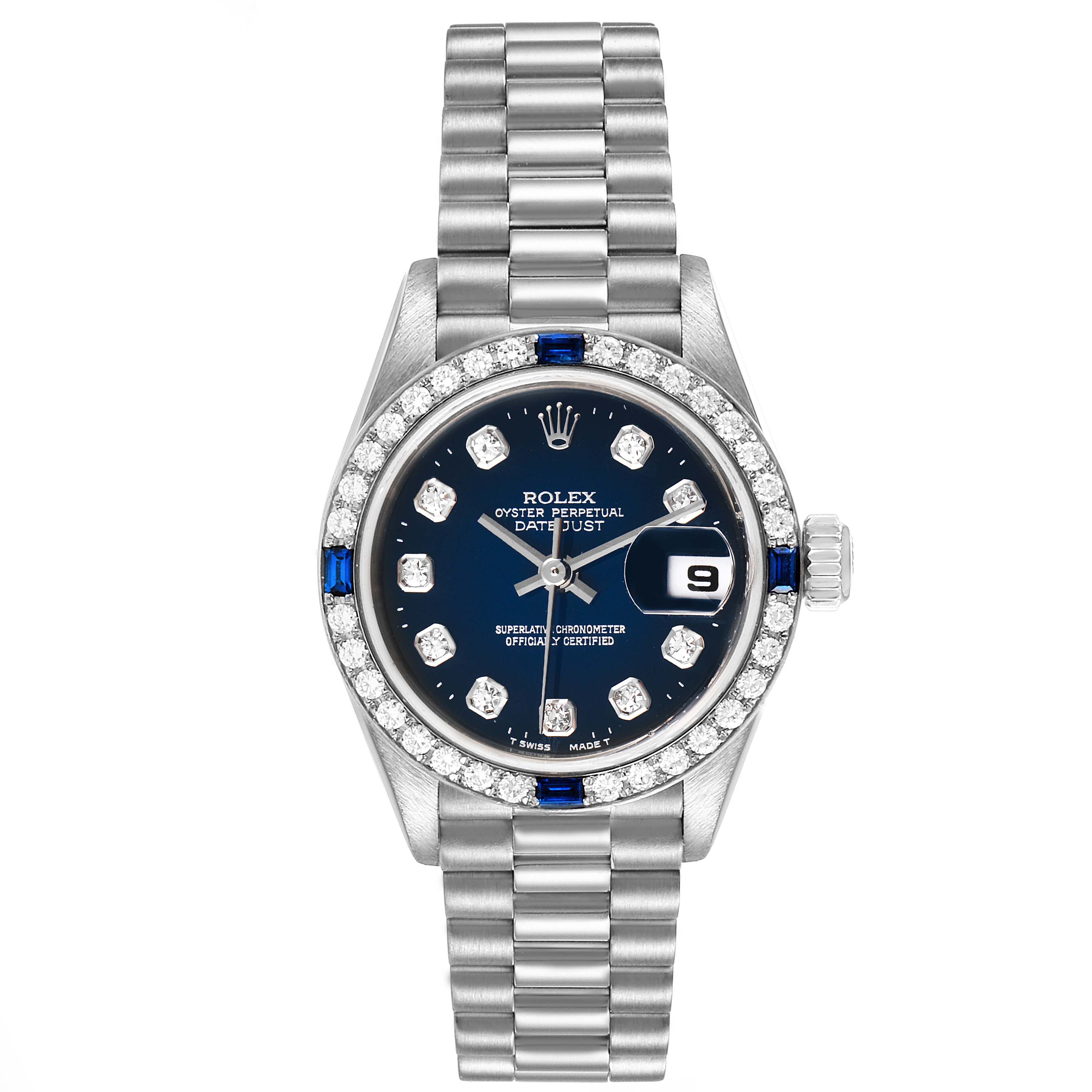 The image shows a front view of a Rolex President 79089 Women's White Gold Blue Dial 79089 Women's White Gold Blue Dial model watch, featuring a blue dial, diamond markers, and a date display.