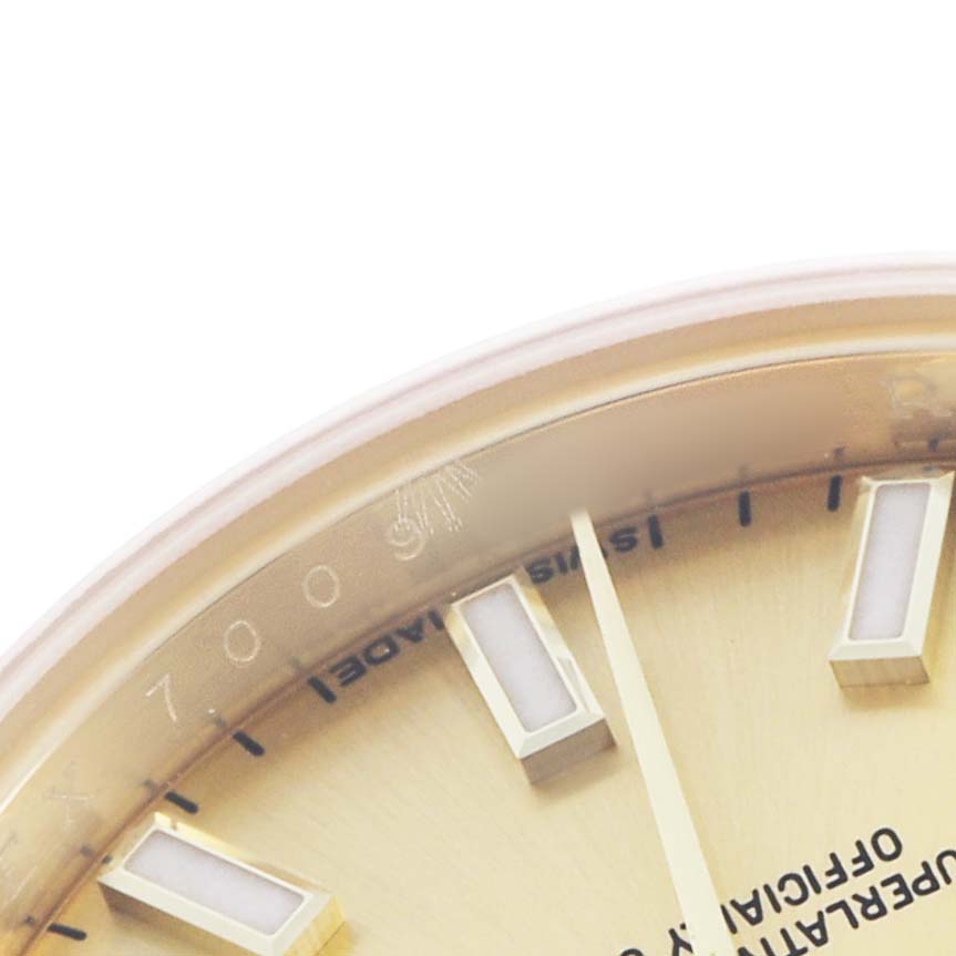 The image shows a close-up of the dial and part of the bezel of a Rolex President 179178 Women's Yellow Gold Champagne Dial model watch.