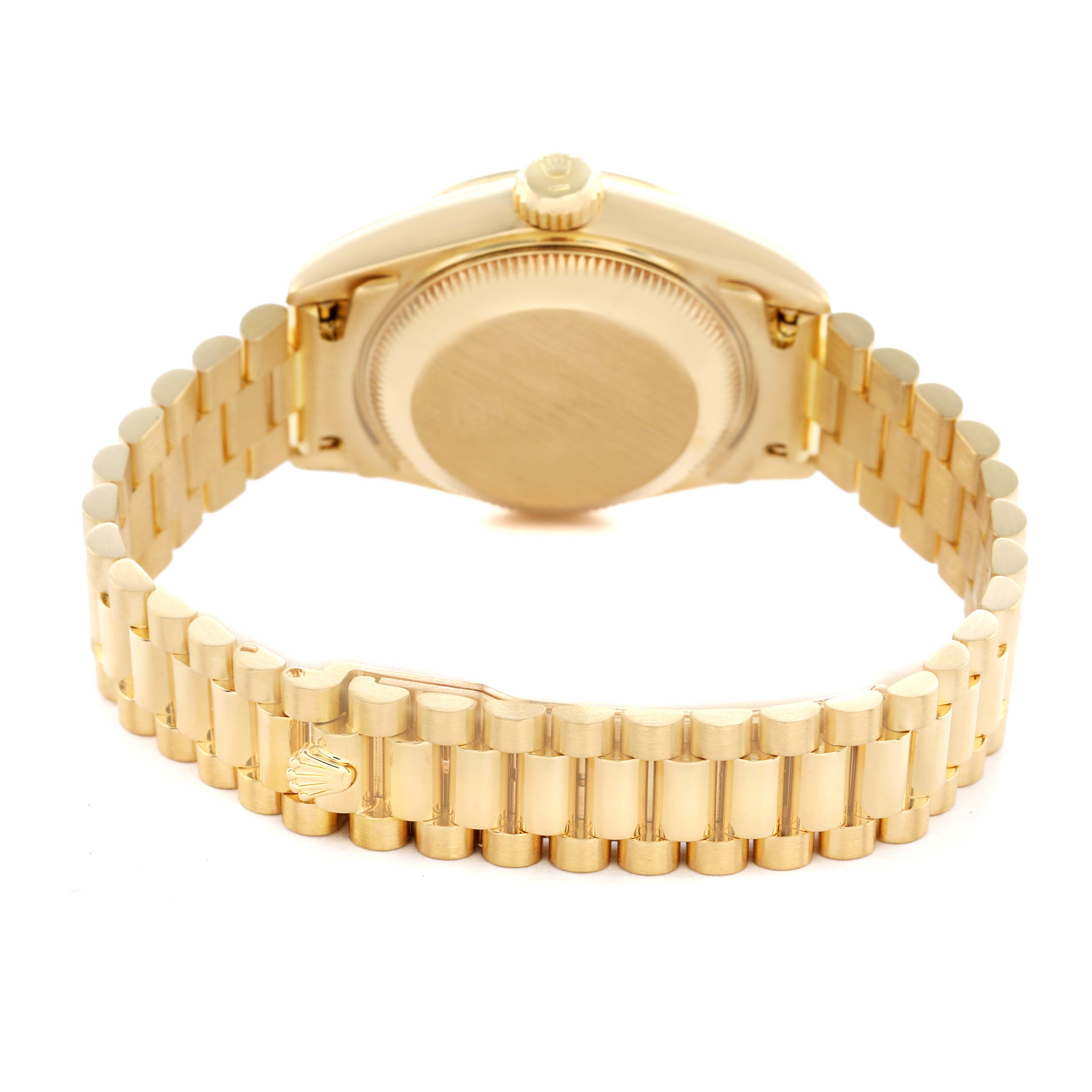 The image shows the back and bracelet of a Rolex President 69258 Women's Yellow Gold Champagne Dial model, focused on the clasp and case back.