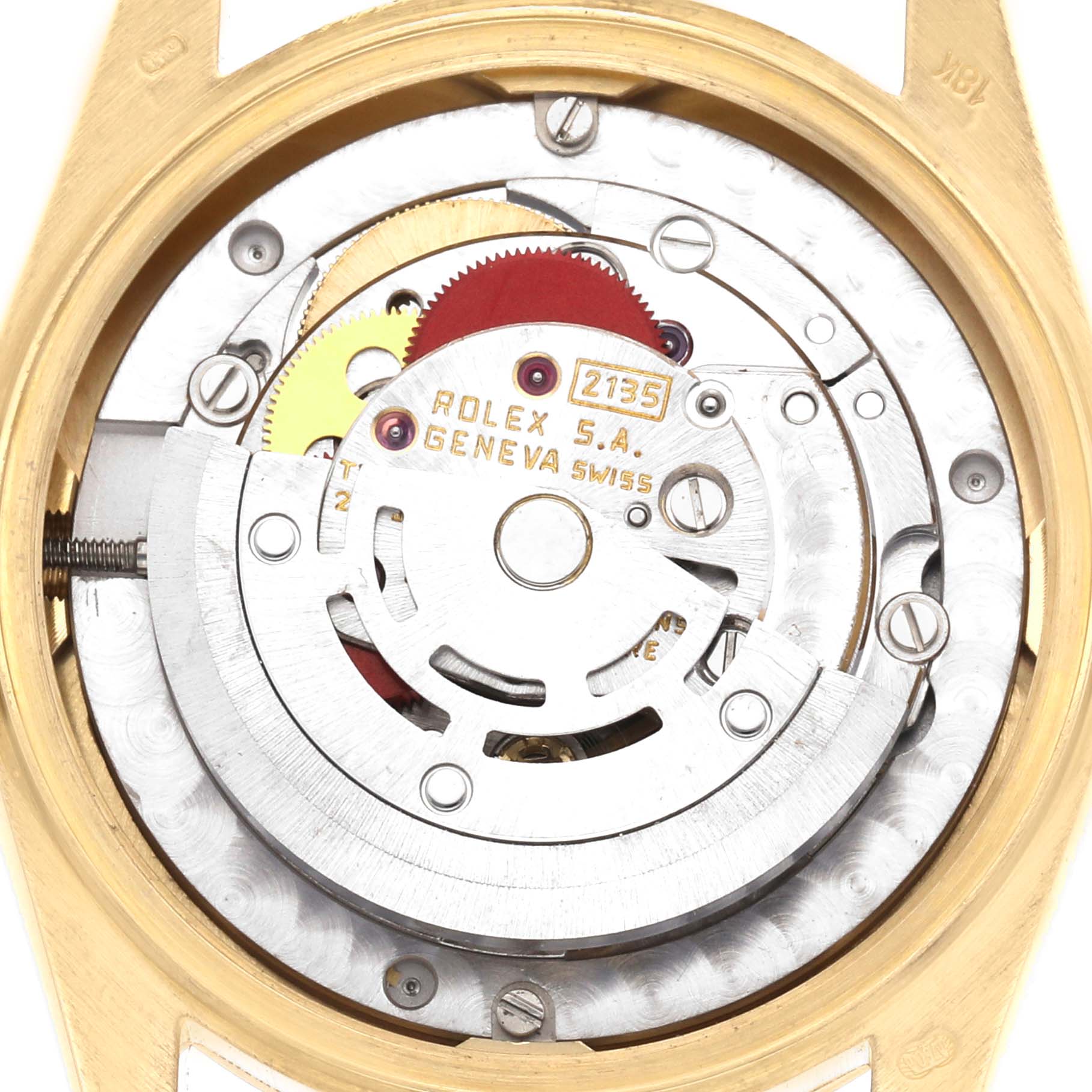 The image shows the intricate movement of a Rolex President 68278 Women's Yellow Gold Champagne Dial model, viewed from the back displaying gears and components.