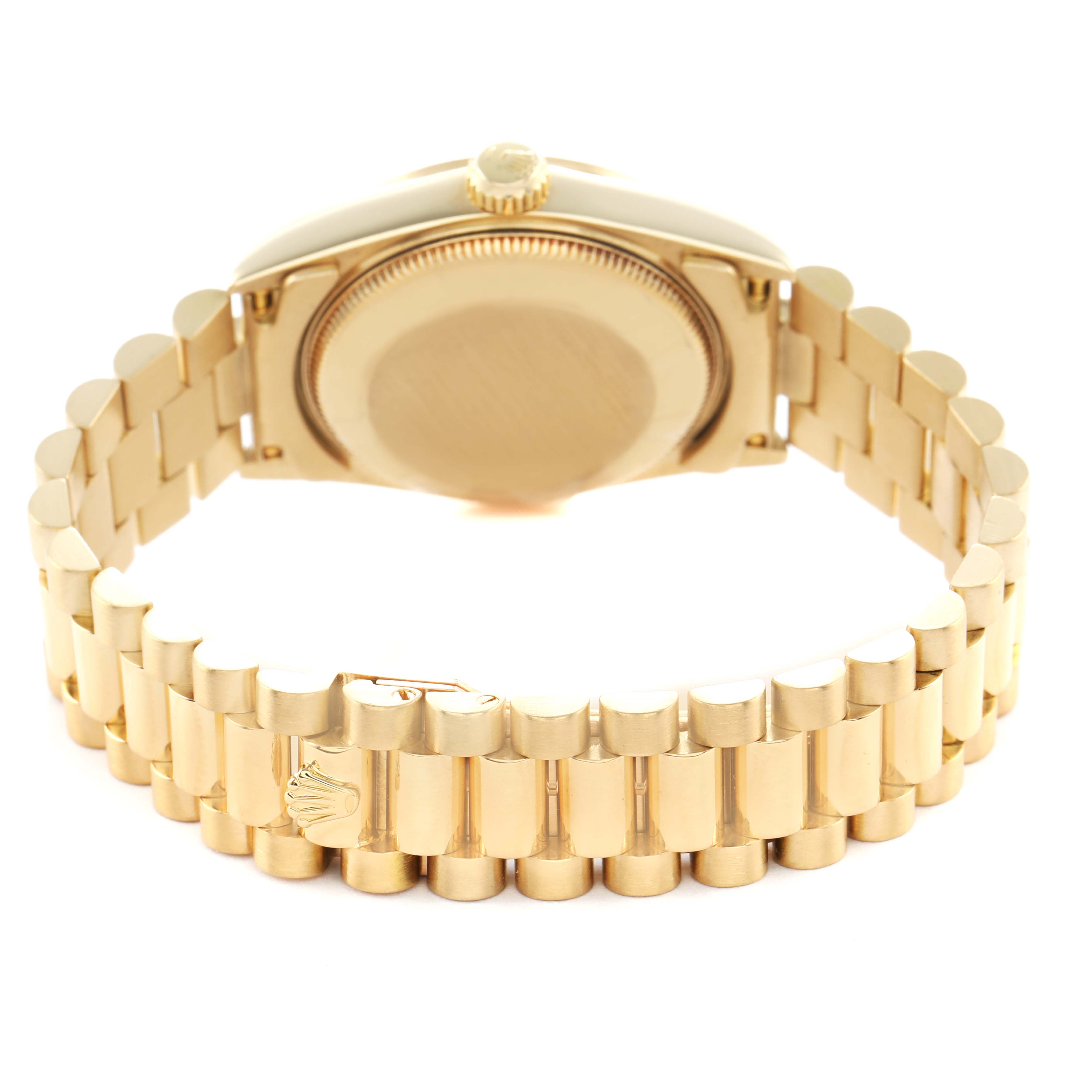 The image shows the back and bracelet of a Rolex President 68278 Women's Yellow Gold Champagne Dial model, highlighting its clasp and case back from a rear angle.