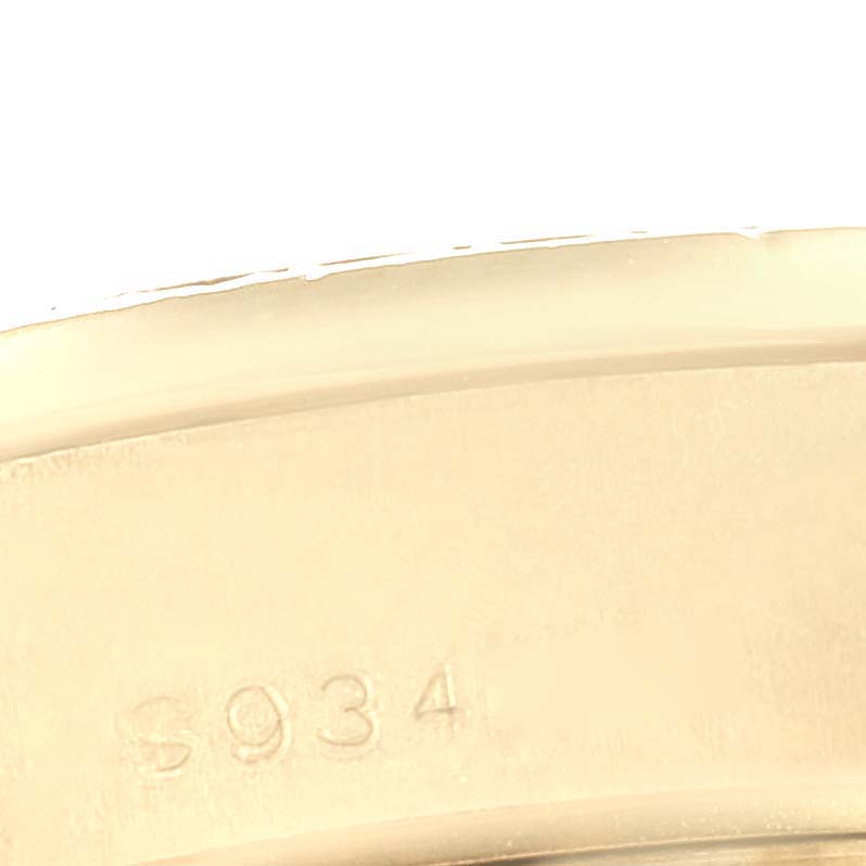 This is a close-up image of the rim of the President model by Rolex, showing some stamped numbers.