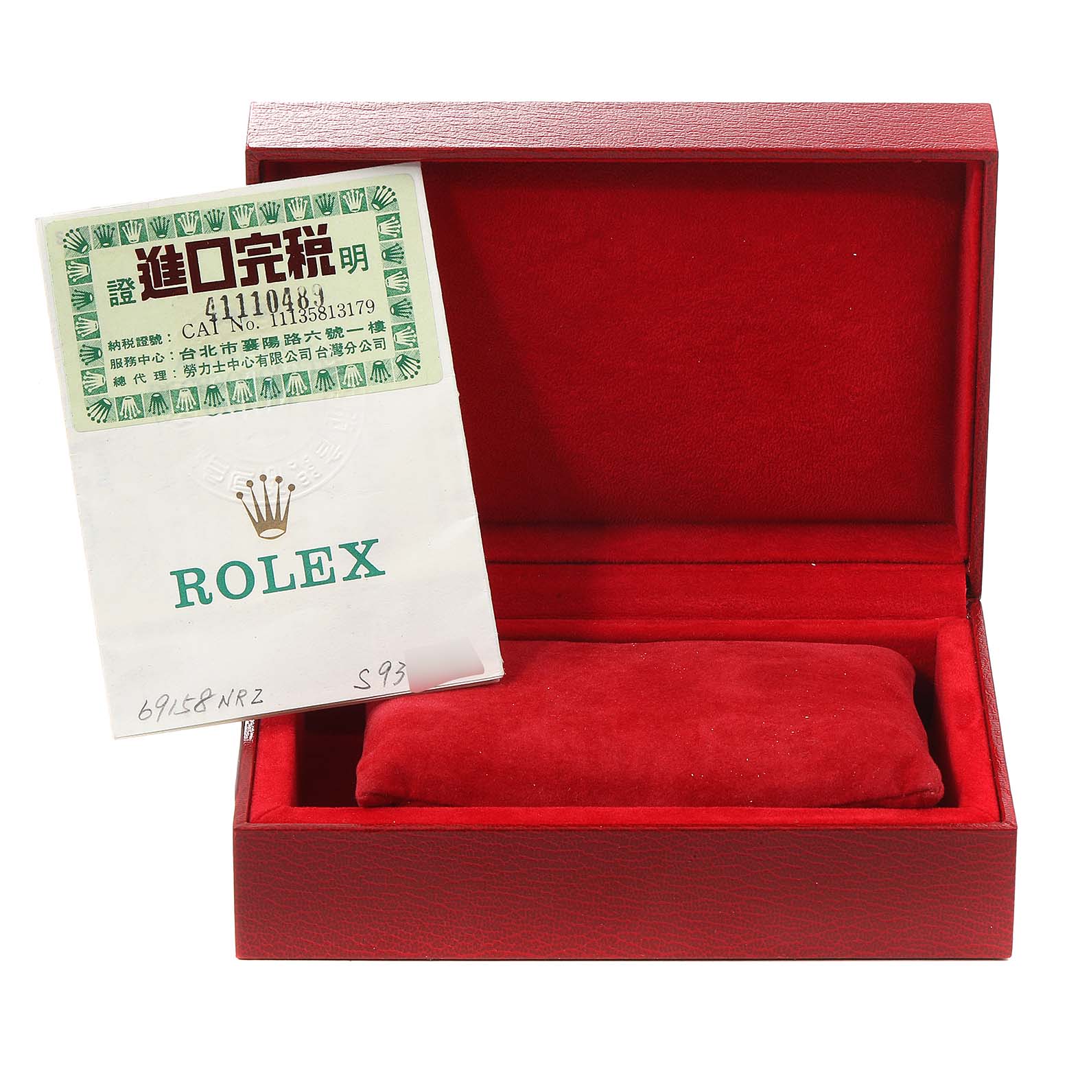 The image shows an open red Rolex watch box for the President model, with a Rolex certificate or booklet placed inside.