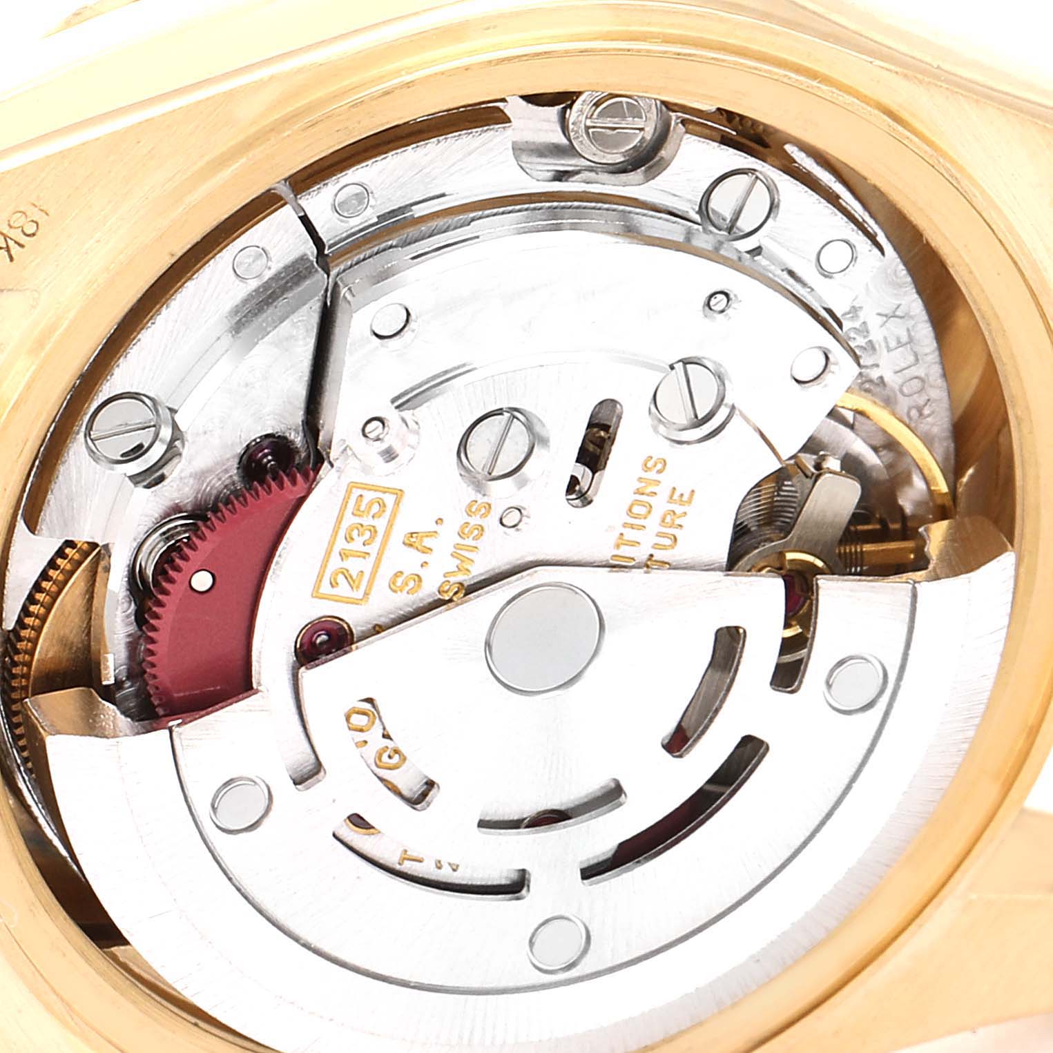 This image shows the inner mechanical movement of a Rolex President 69158 Women
s Yellow Gold Mother of Pearl Dial 69158 Women
s Yellow Gold Mother of Pearl Dial model watch from a back angle.