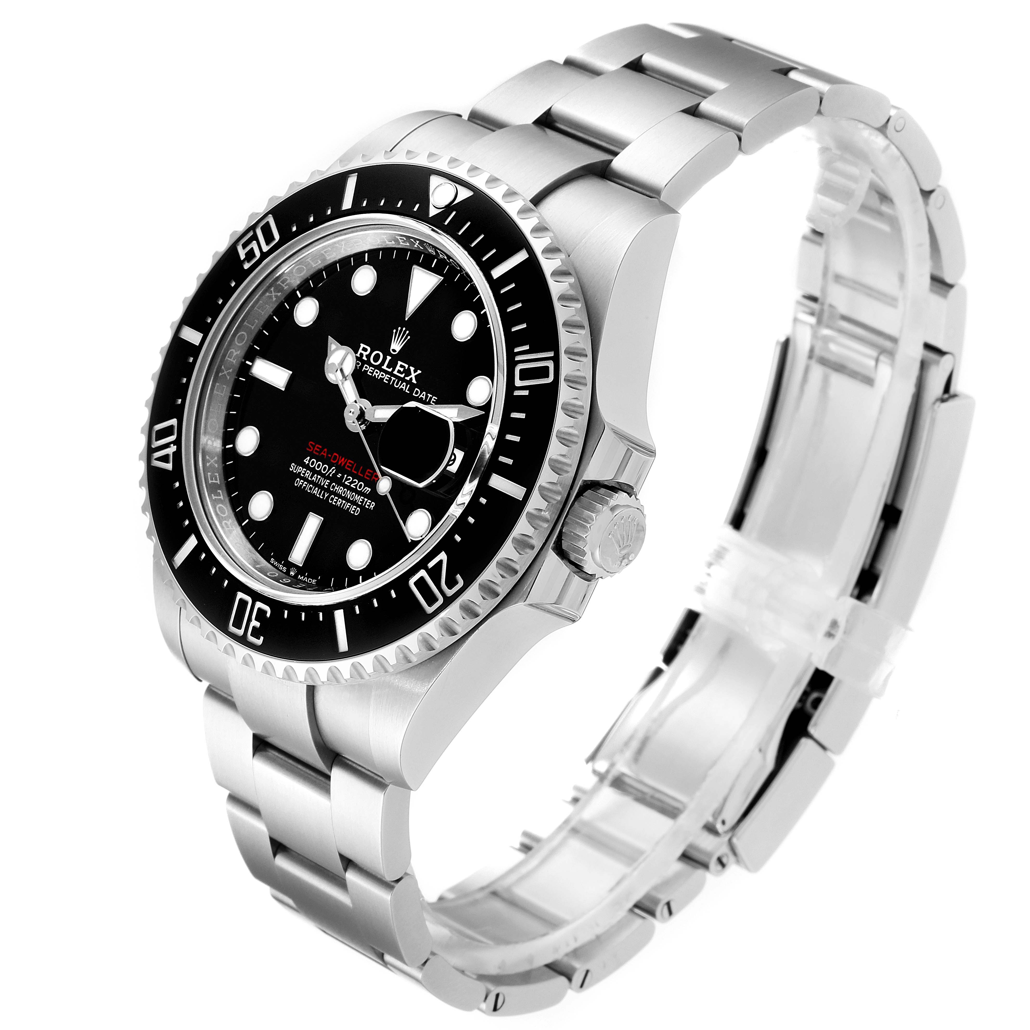 The image shows a Rolex Sea-Dweller 126600 Men
s Stainless Steel Black Dial 126600 Men
s Stainless Steel Black Dial watch at an angled view, highlighting its face, bezel, crown, and stainless steel bracelet.