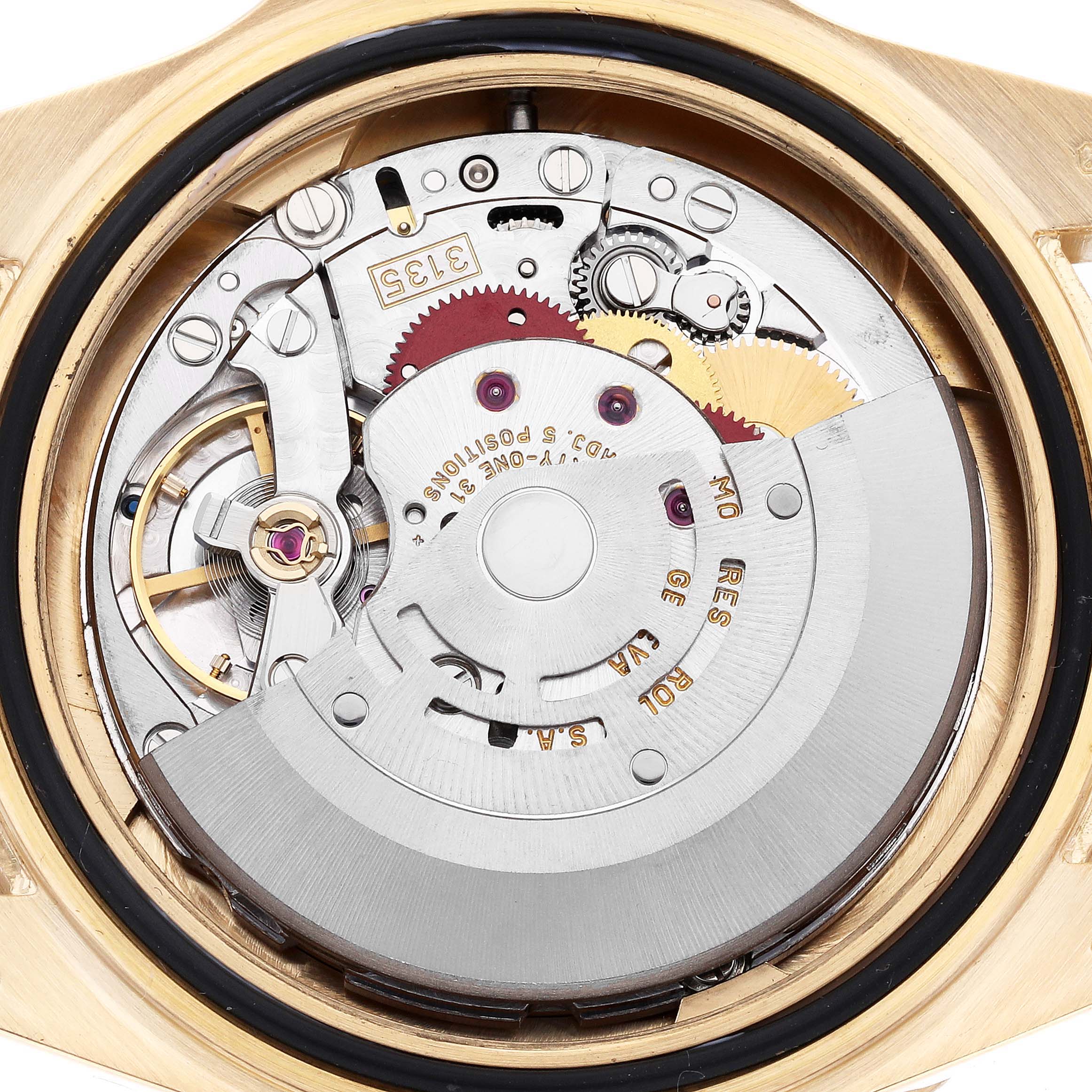 The image shows the intricate movement mechanism of a Rolex Submariner 16618 Men's Yellow Gold Blue Dial 16618 Men's Yellow Gold Blue Dial watch from a back view.