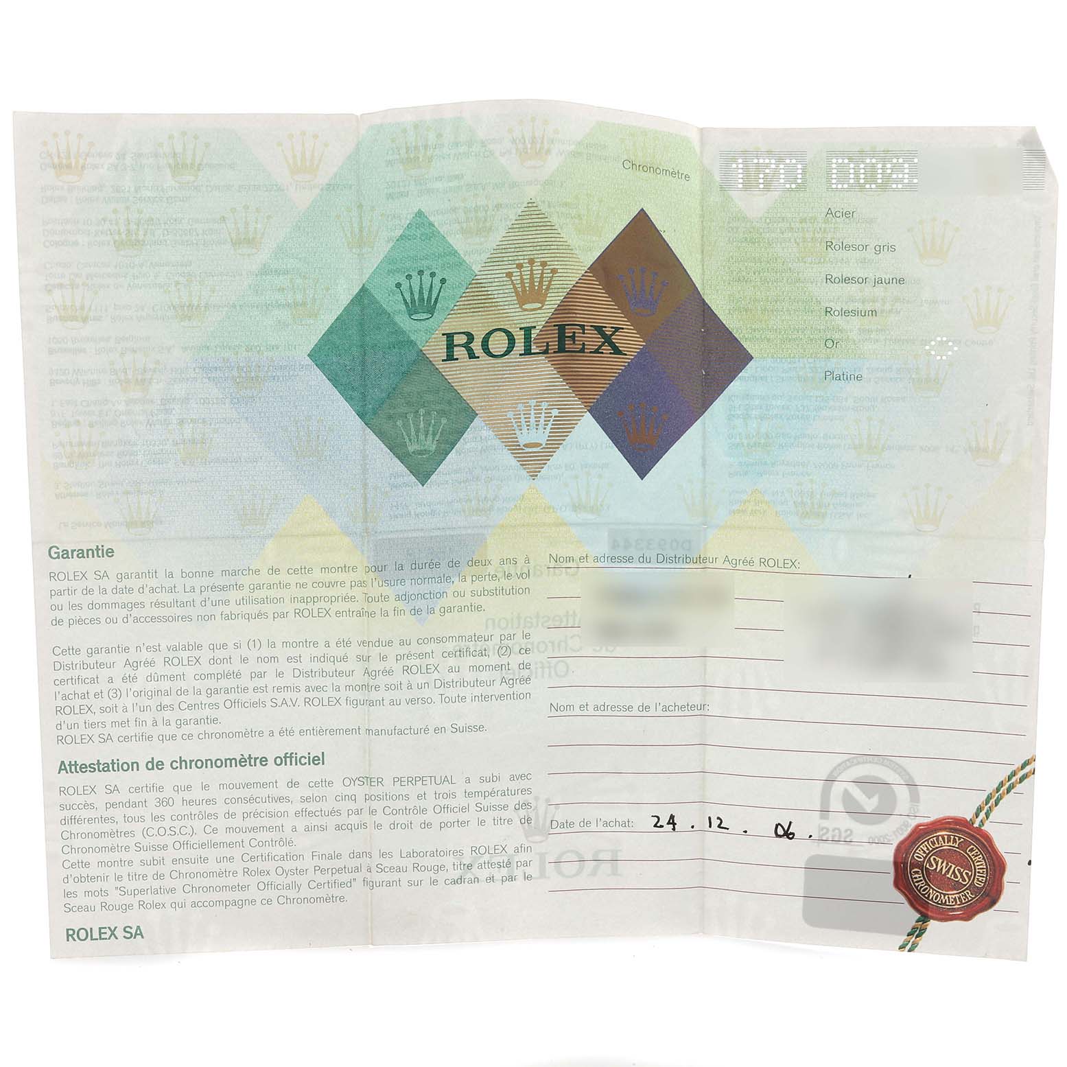 The image shows the guarantee and chronometer certification papers for a Rolex Submariner 16618 Men's Yellow Gold Blue Dial 16618 Men's Yellow Gold Blue Dial watch.