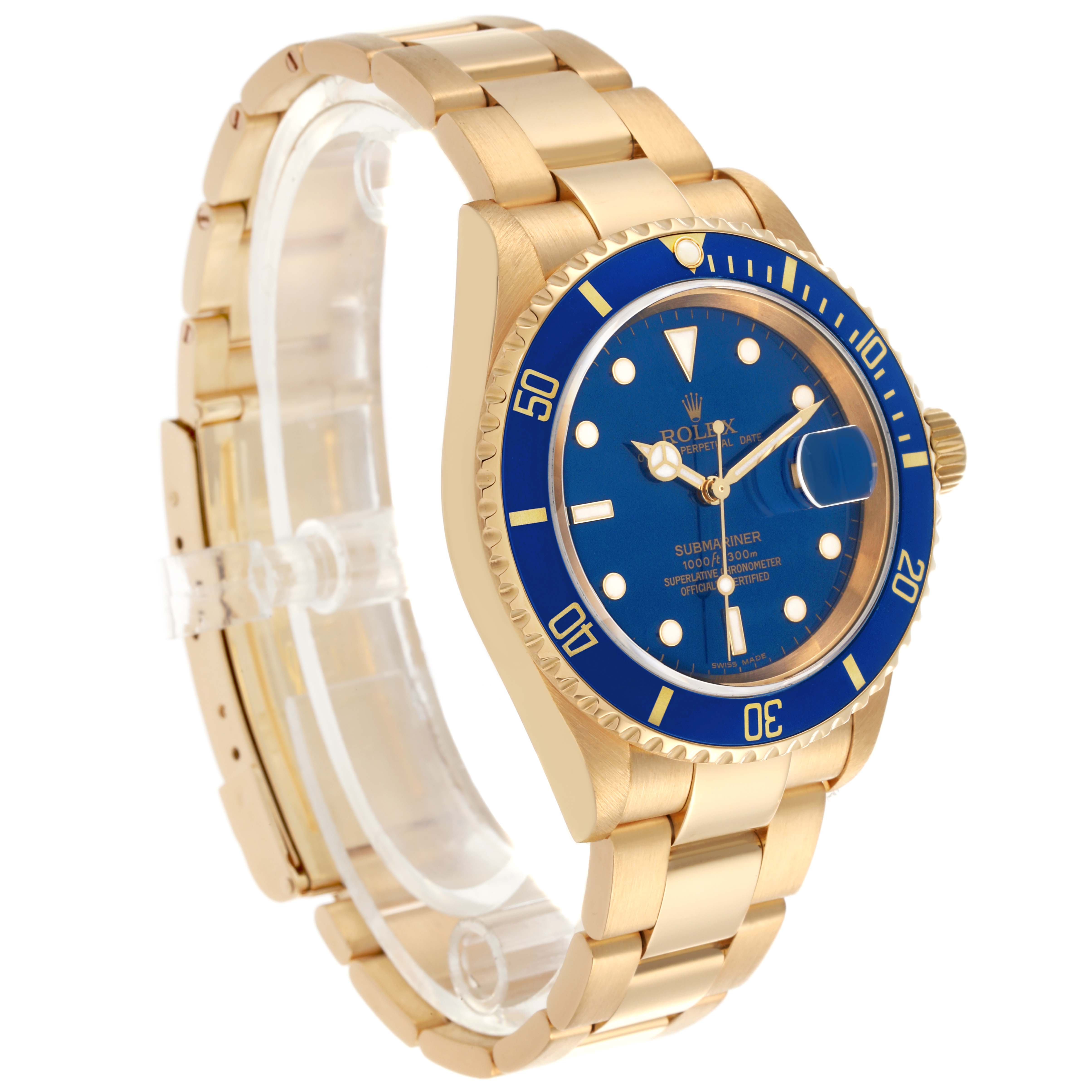 The Rolex Submariner 16618 Men's Yellow Gold Blue Dial 16618 Men's Yellow Gold Blue Dial watch is shown at a three-quarter angle, highlighting the blue bezel, dial, gold case, and bracelet.