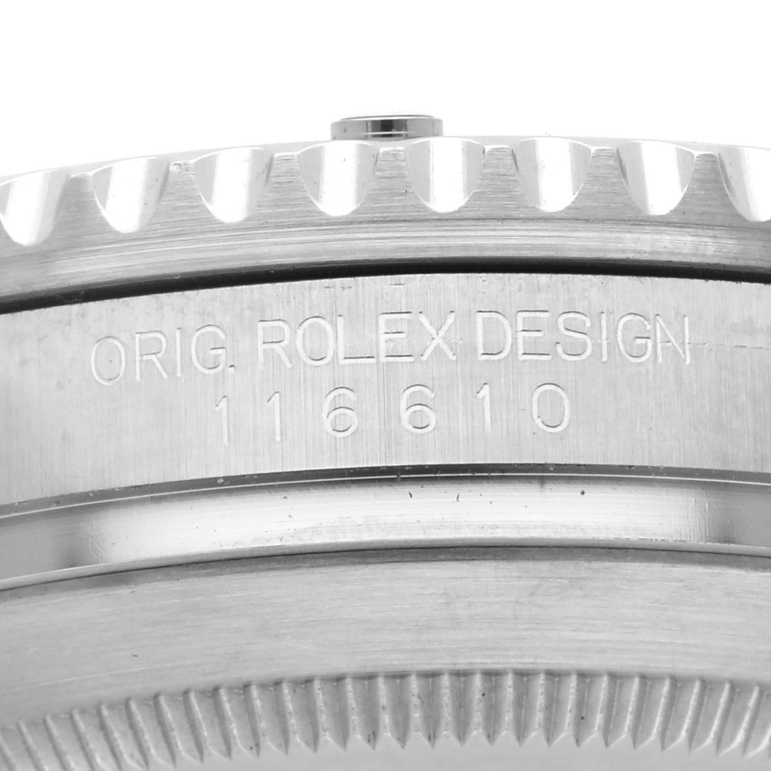 The image shows a side view of the bezel and engravings on the Rolex Submariner 116610LV Men's Stainless Steel Green Dial 116610LV Men's Stainless Steel Green Dial model.