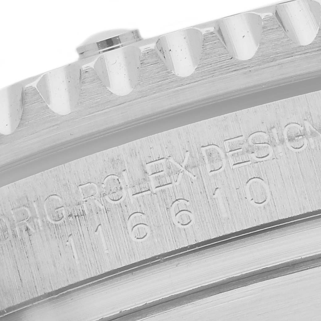 The image shows a side view of a Rolex Submariner 116610LV Men's Stainless Steel Green Dial 116610LV Men's Stainless Steel Green Dial's bezel and engraved case side.