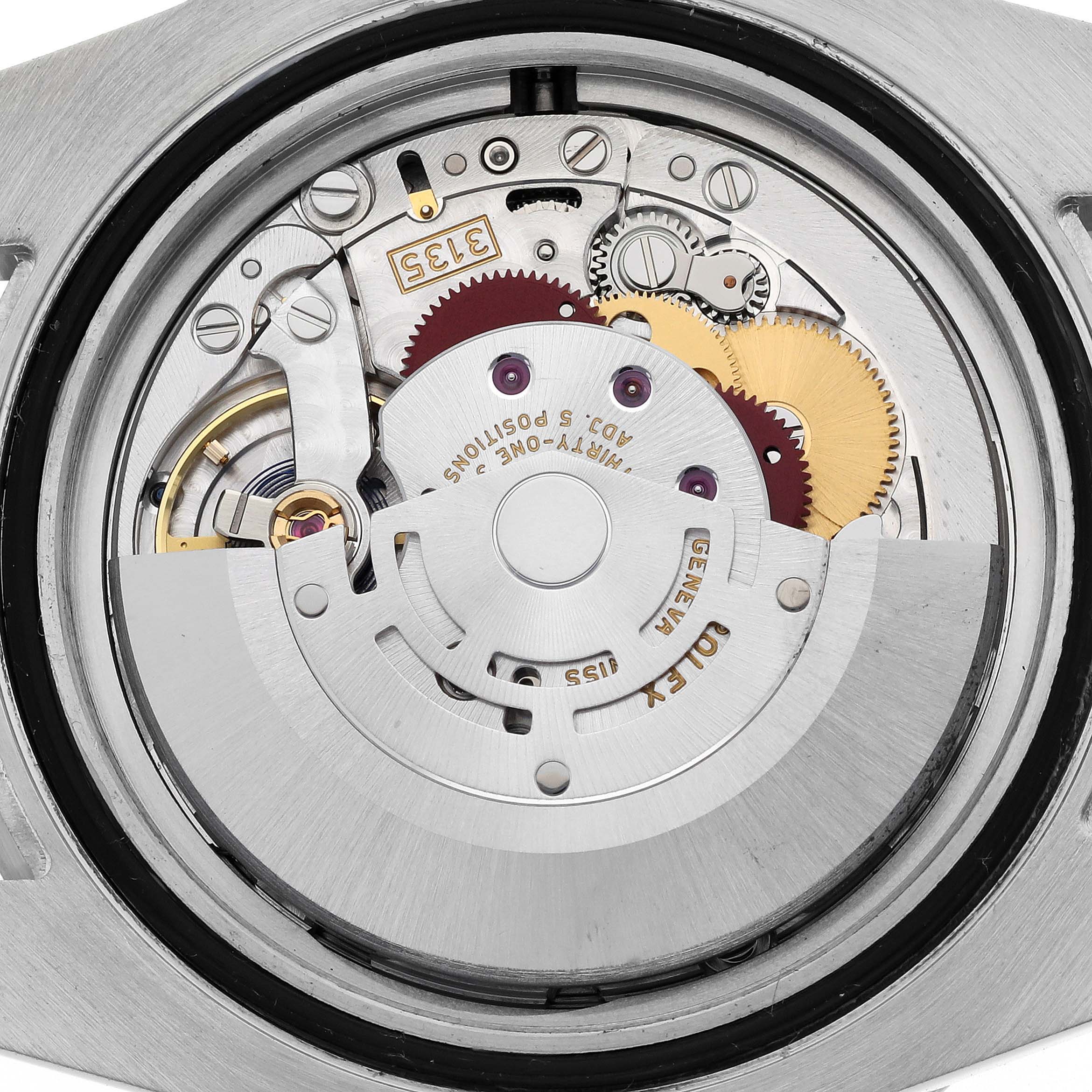 This is a close-up view of the Rolex Submariner 116610LV Men's Stainless Steel Green Dial 116610LV Men's Stainless Steel Green Dial's movement, showing gears and components from the back.