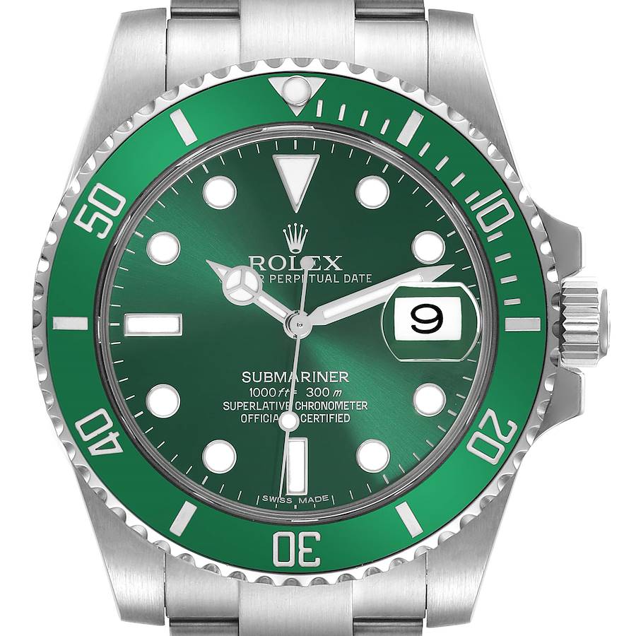 The image shows a frontal view of the Rolex Submariner, highlighting the green bezel, dial, and date magnifier.