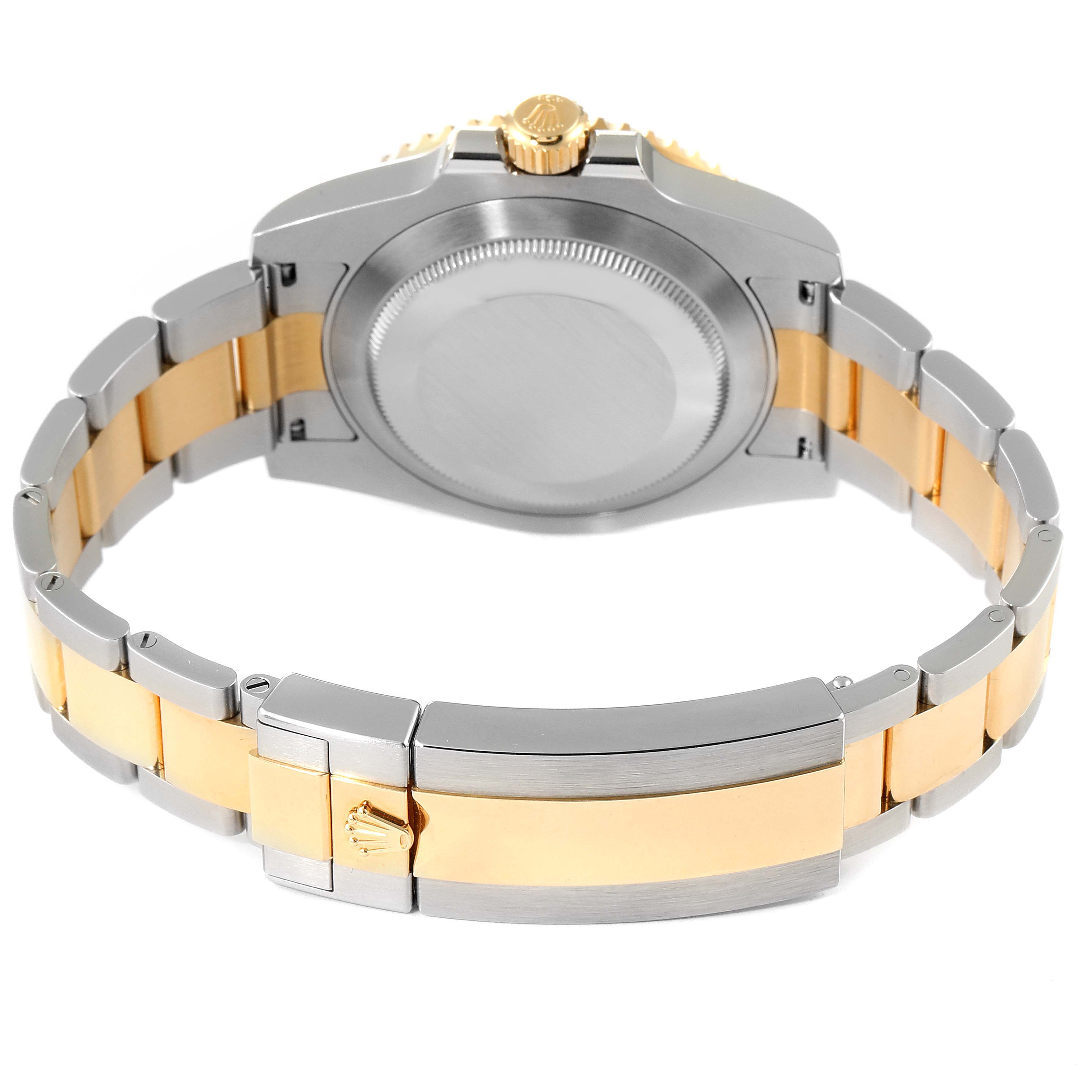 This image shows the back view of the Rolex Submariner 116613 Men's Steel and Gold (two tone) Blue Dial 116613 Men's Steel and Gold (two tone) Blue Dial, highlighting the case back, bracelet, and clasp.