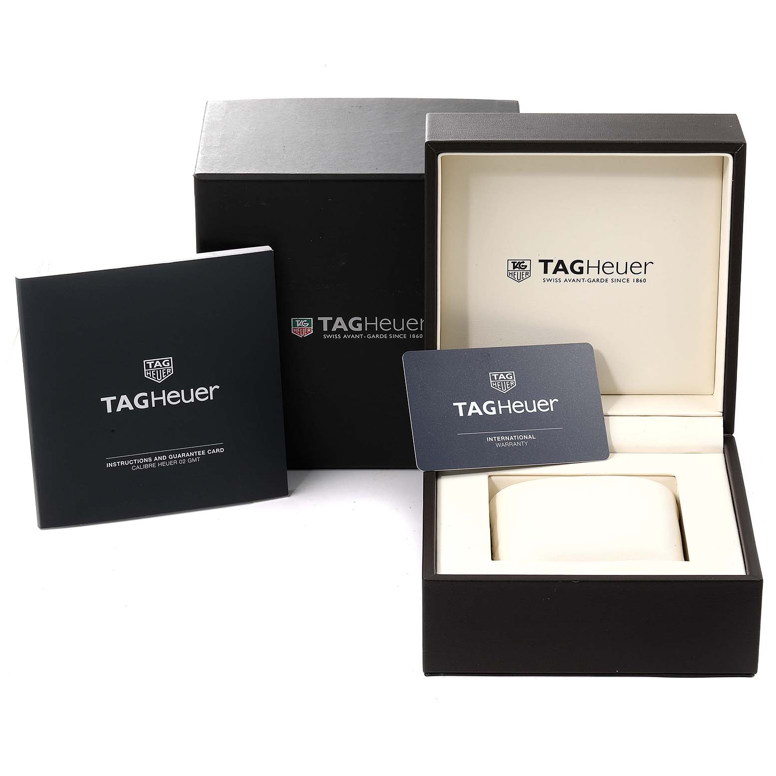 The image shows the Tag Heuer Carrera CBG2A11.FC6460 Men
s Stainless Steel Blue Dial CBG2A11.FC6460 Men
s Stainless Steel Blue Dial watch
s packaging, including the box, instruction booklet, and warranty card.