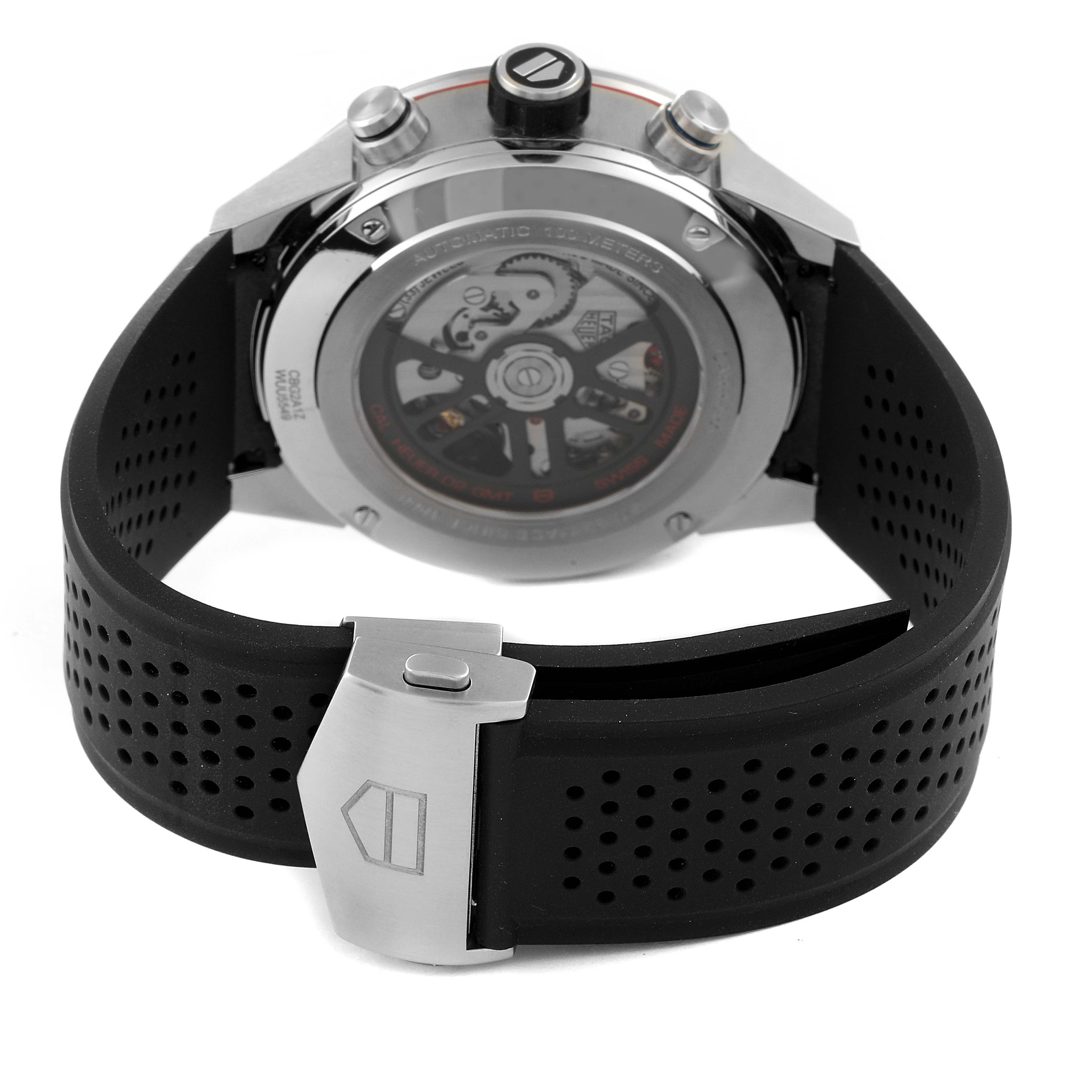 This image shows the back of a Tag Heuer Carrera CBG2A11.FC6460 Men
s Stainless Steel Blue Dial CBG2A11.FC6460 Men
s Stainless Steel Blue Dial watch, highlighting its automatic movement and black perforated strap.