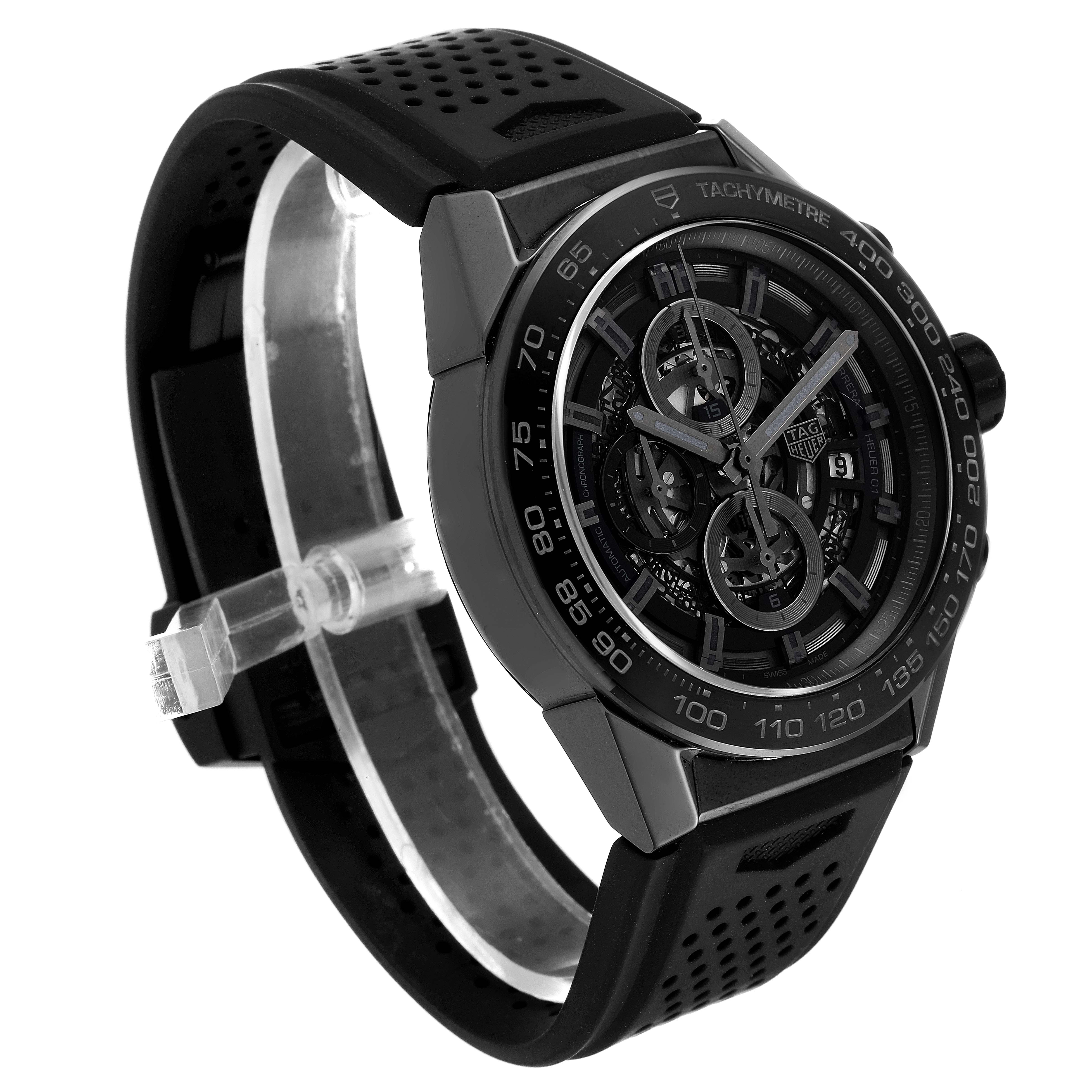 The Tag Heuer Carrera CAR2A90.FT6071 Men's Ceramic Black Dial CAR2A90.FT6071 Men's Ceramic Black Dial watch is shown at a three-quarter angle, highlighting the dial, bezel, and black rubber strap.