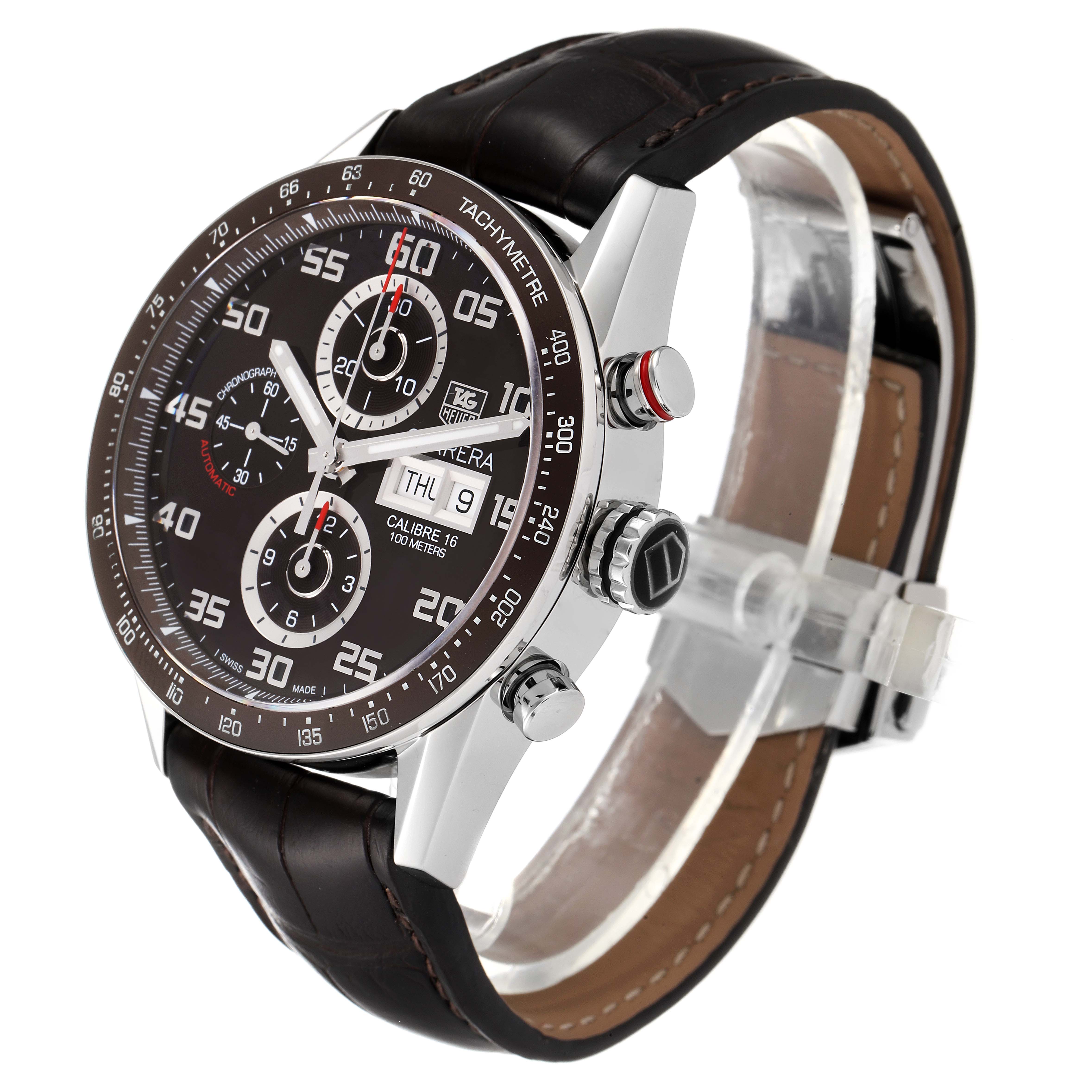 The Tag Heuer Carrera CV2A1S.FC6236 Men's Stainless Steel Brown Dial CV2A1S.FC6236 Men's Stainless Steel Brown Dial watch is shown from a three-quarter angle, displaying its chronograph functions, tachymeter bezel, and leather strap.