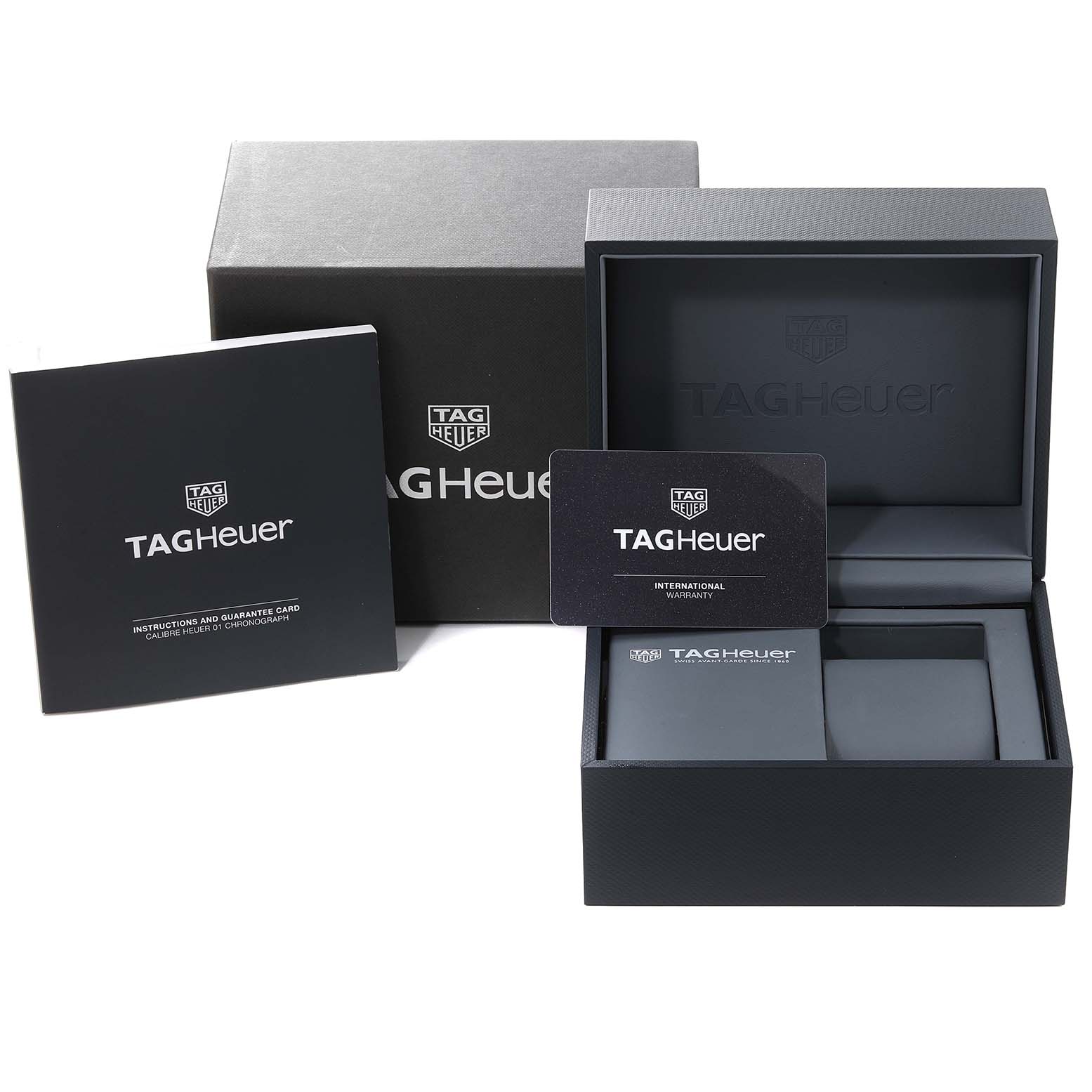 This image shows the packaging, instruction manual, and warranty card for the Tag Heuer Carrera CAR2A5A Men's Titanium Transparent Dial CAR2A5A Men's Titanium Transparent Dial model watch.