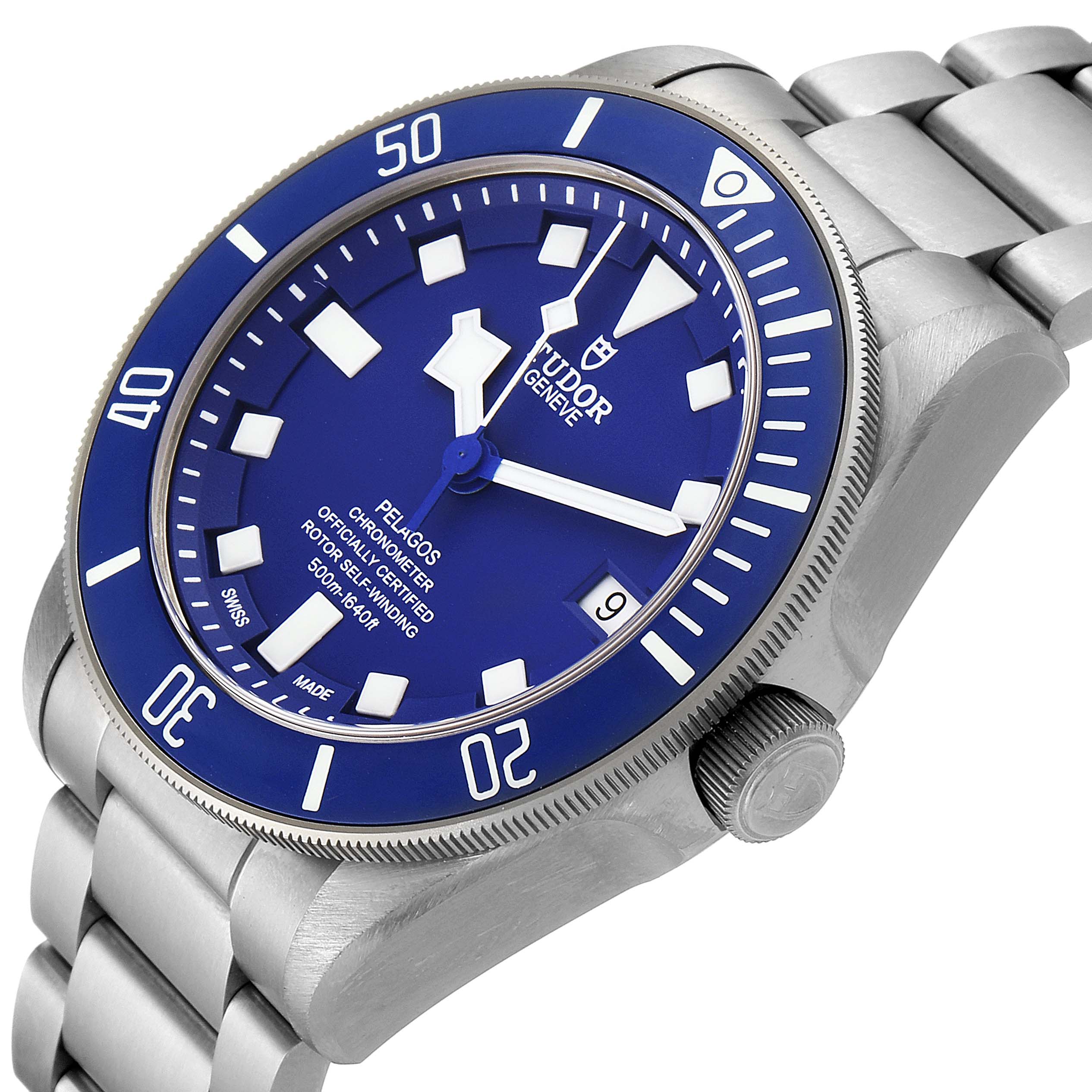 The image shows a Tudor Pelagos 25600TV Men's Titanium Blue Dial 25600TV Men's Titanium Blue Dial watch with a blue dial and bezel, viewed from an angled perspective, highlighting the crown, face, and bracelet.