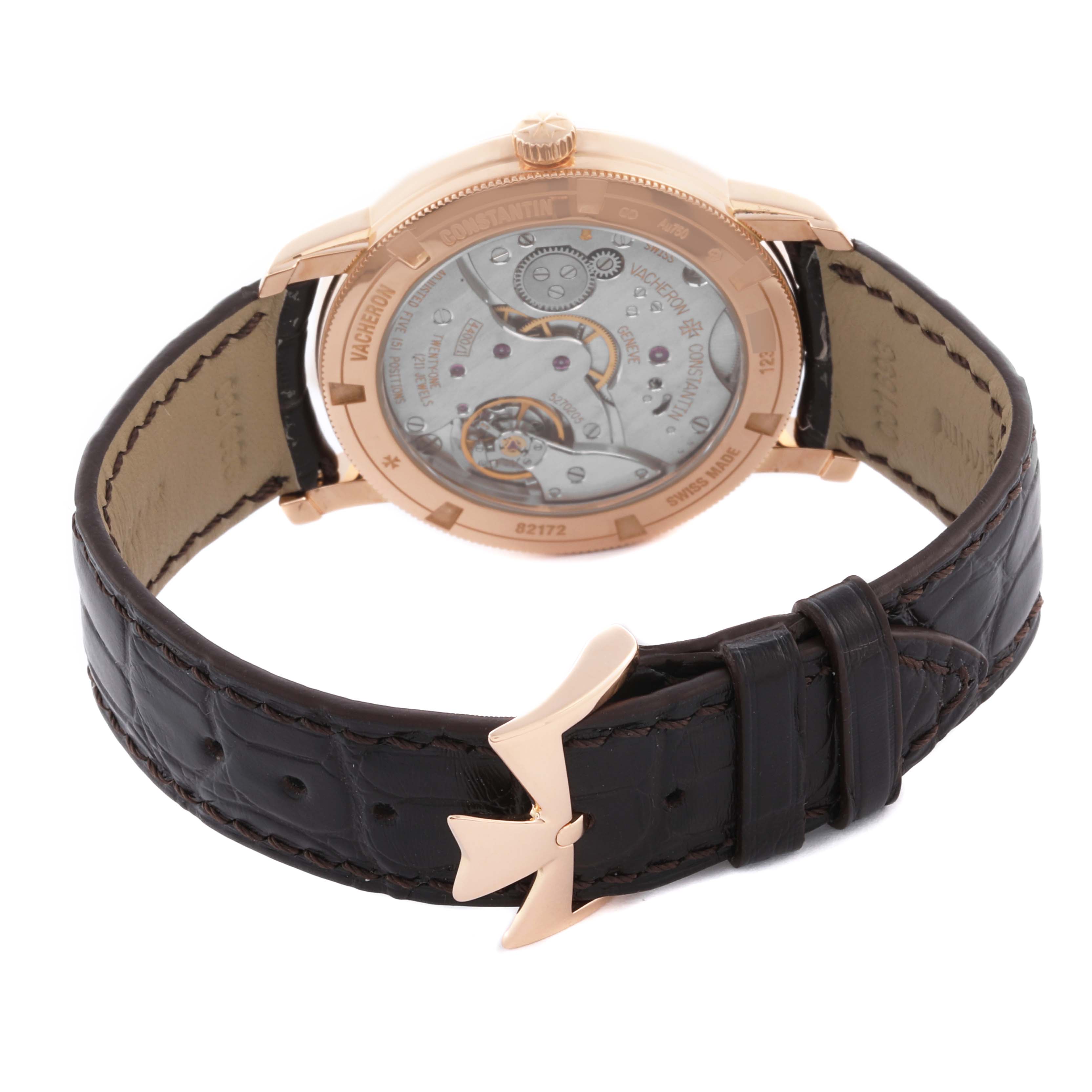 The Vacheron Constantin Traditionnelle 82172/000R-9382 Men's Rose Gold Silver Dial 82172/000R-9382 Men's Rose Gold Silver Dial watch is shown from the back, displaying its movement and leather strap with buckle.