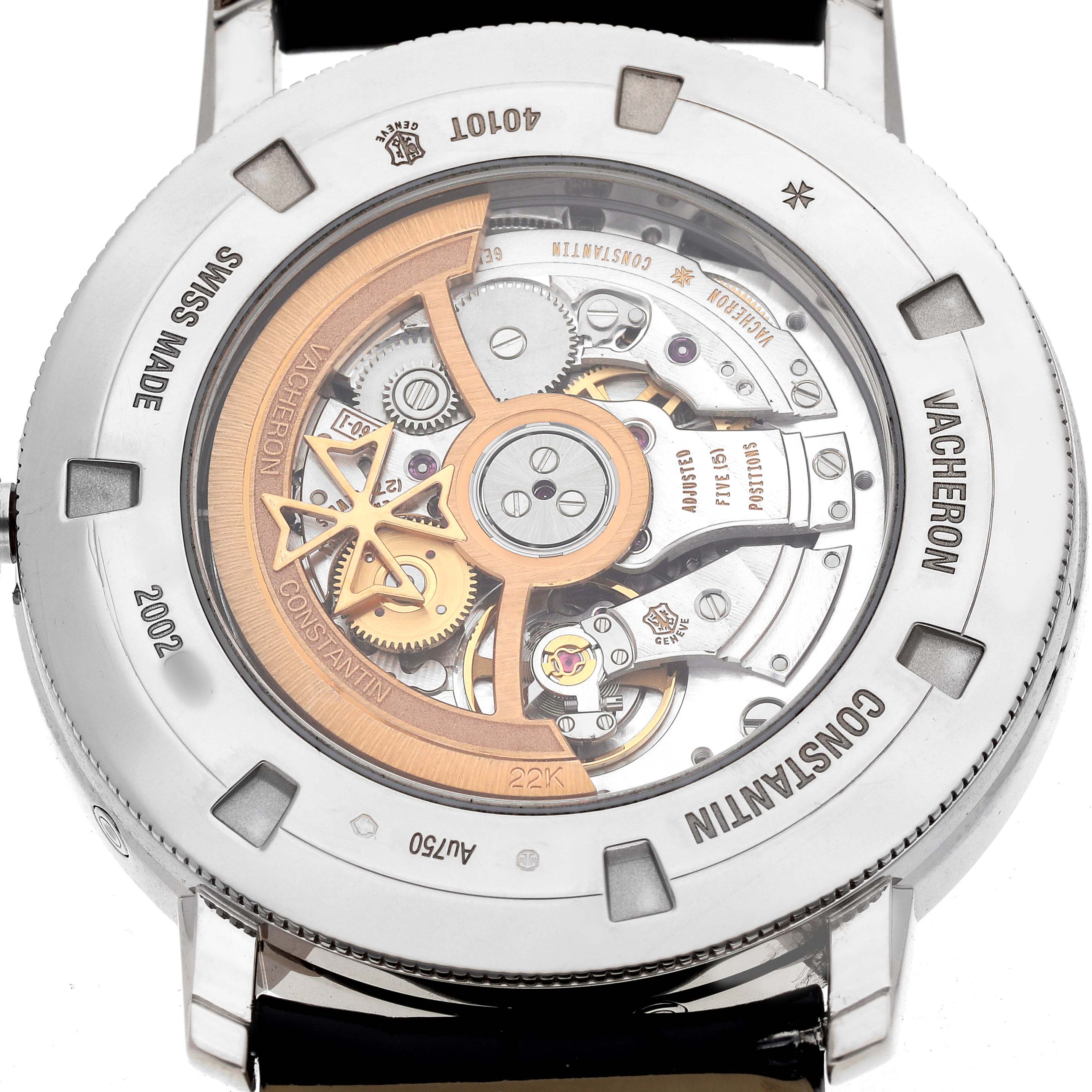 The image shows the back of the Vacheron Constantin Traditionnelle 4010T/000G-B740 Men's White Gold Grey Dial watch, highlighting its intricate movement and rotor.