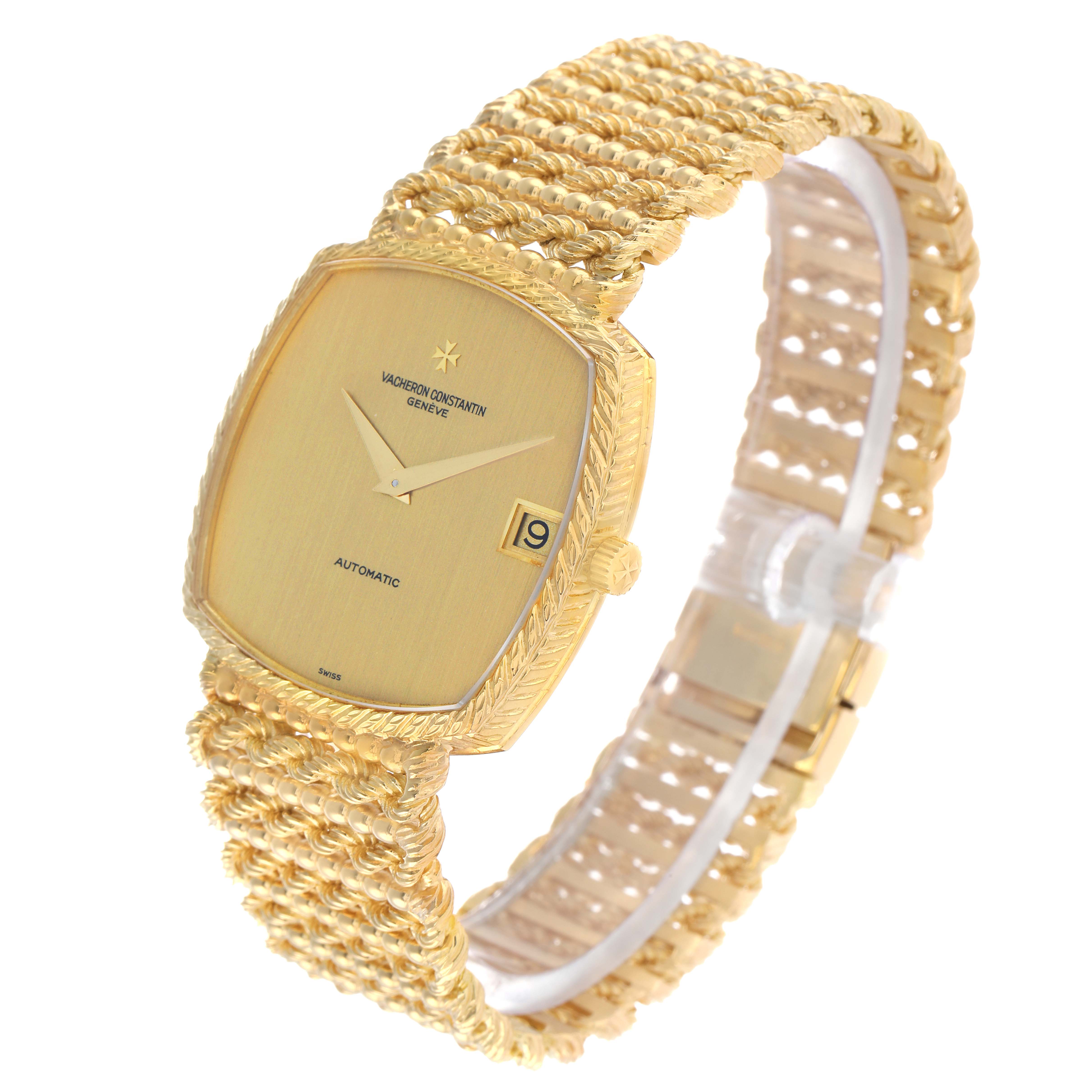 The Vintage Vacheron Constantin watch is shown at a 3/4 angle highlighting the gold case, dial, and intricate bracelet.