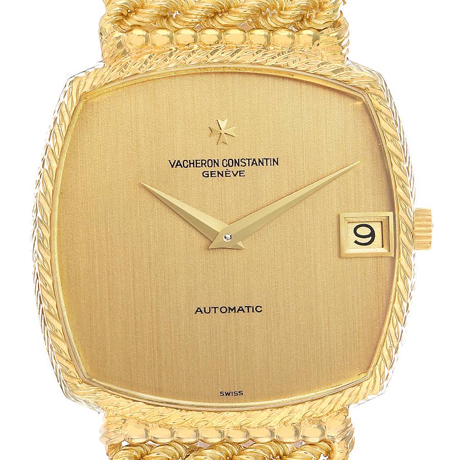 The image shows a front view of a Vintage Vacheron Constantin watch with a gold-toned dial, hands, and date window.