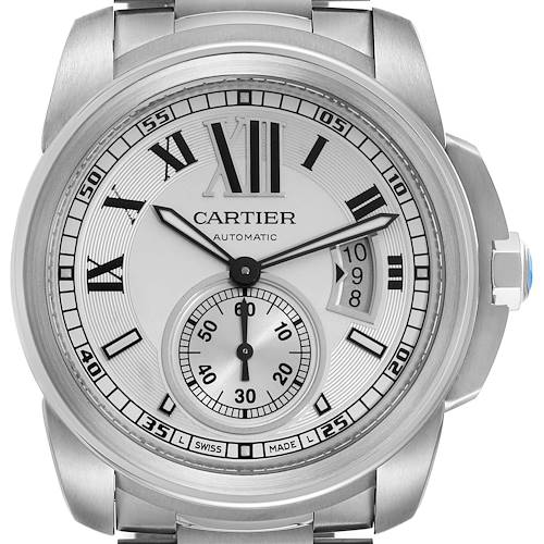 The image shows a front view of the Calibre de Cartier watch, highlighting its dial, hands, and date window.