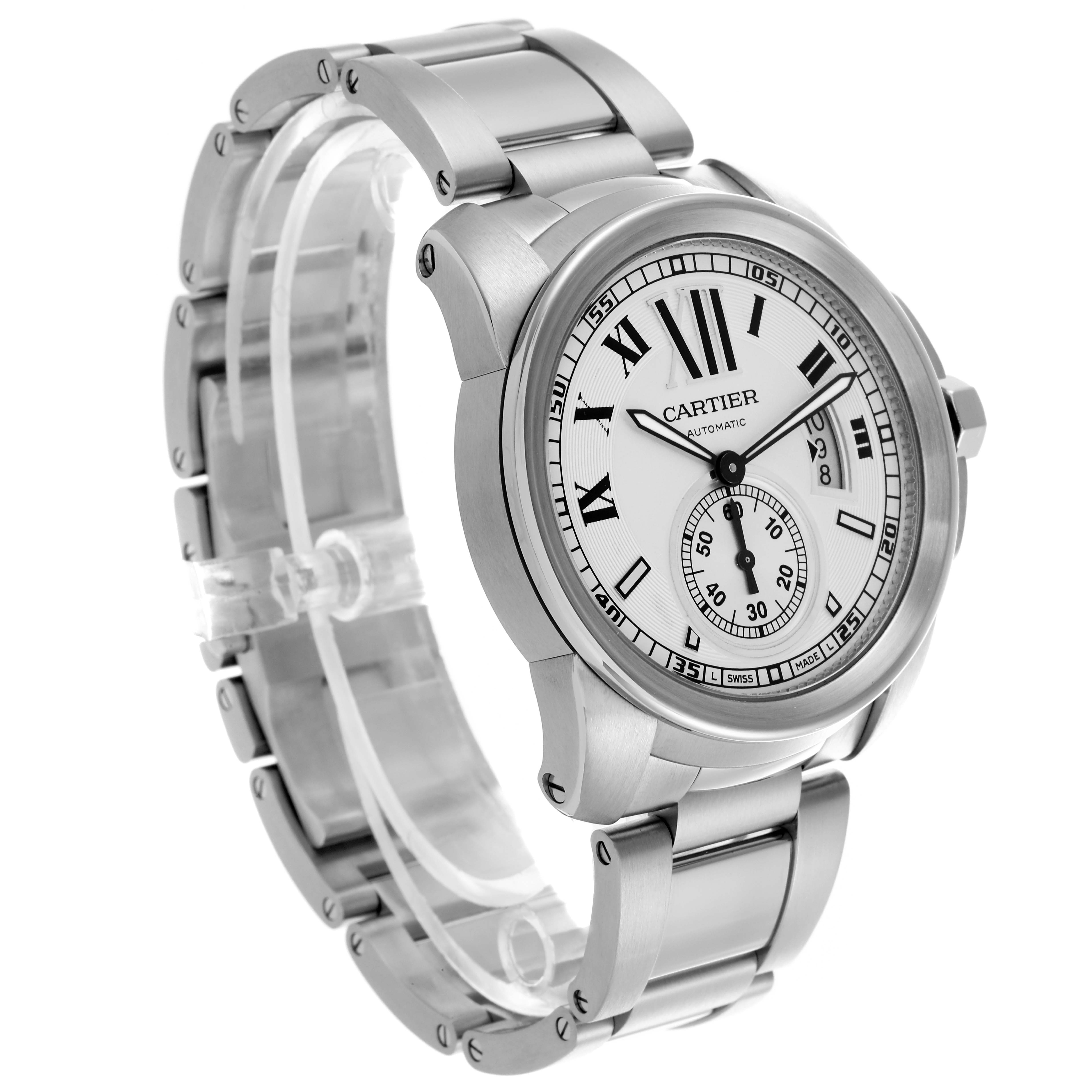 The Calibre de Cartier watch is shown at a three-quarter angle, displaying the face, bezel, and bracelet.