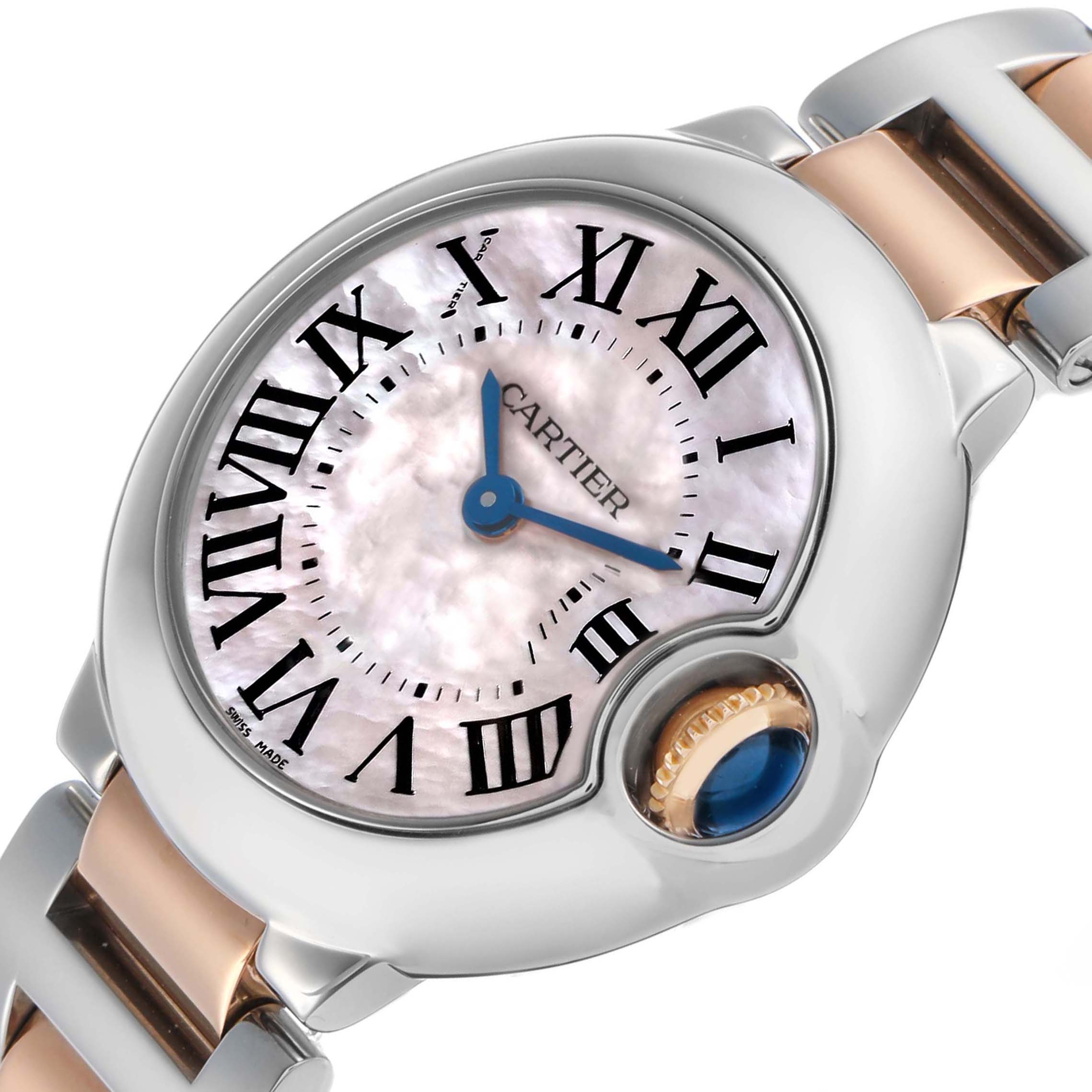 The Ballon Bleu by Cartier is shown at an angle highlighting the dial, Roman numerals, and the cabochon crown.
