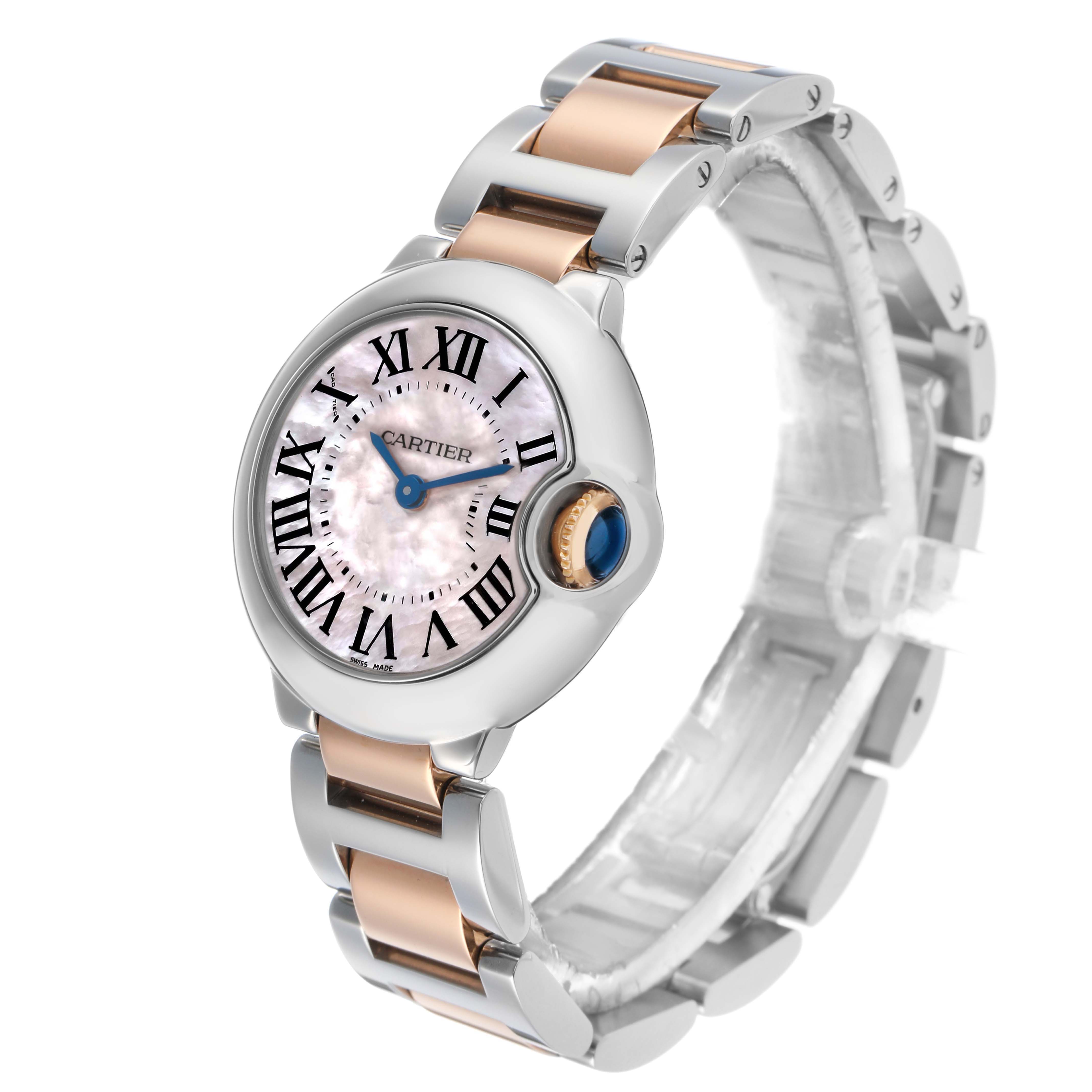 The Cartier Ballon Bleu W6920034 Women's Steel and Gold (two tone) Mother of Pearl Dial watch is shown at a slightly angled front view, highlighting its face, Roman numerals, and metal bracelet.