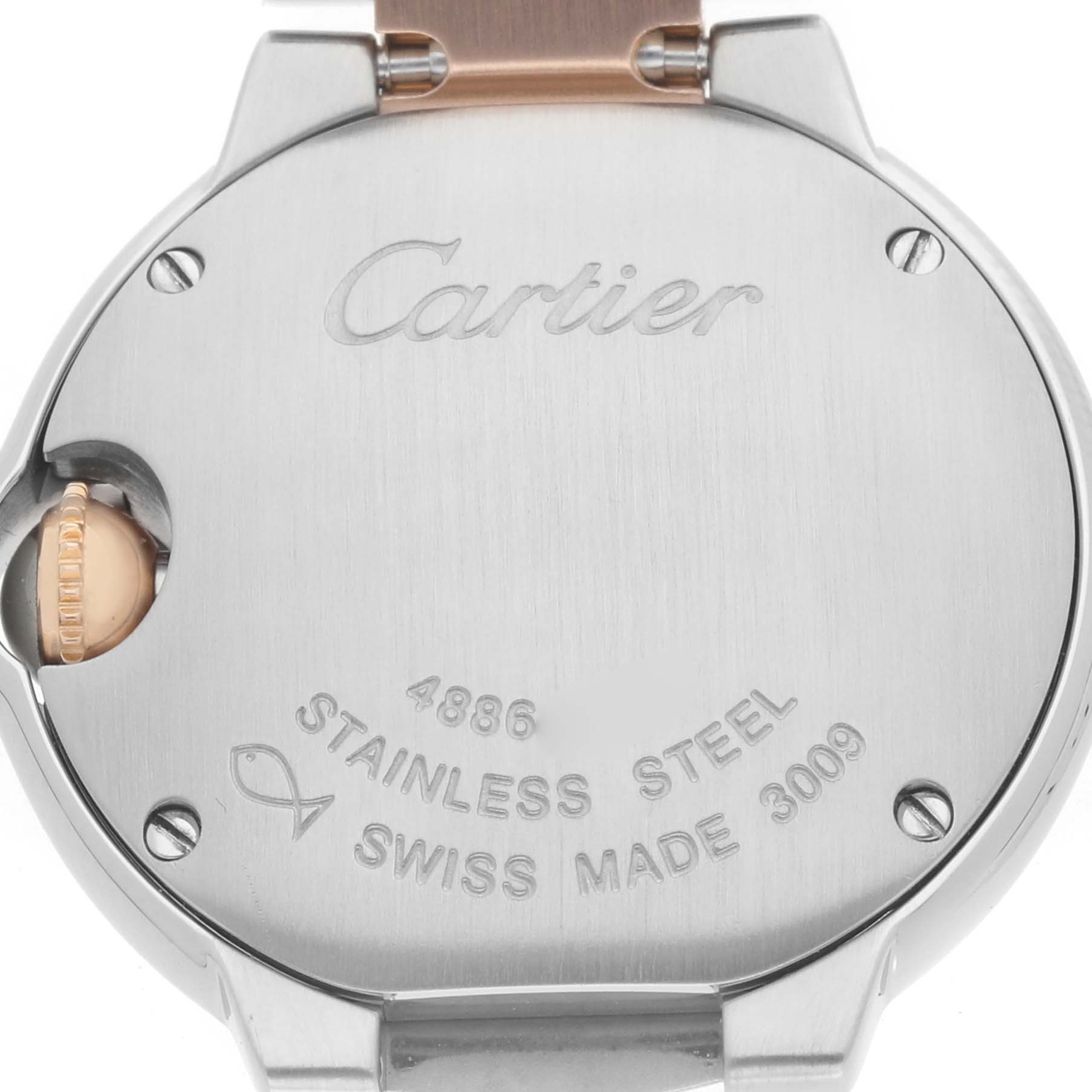 The image shows the back of a Cartier Ballon Bleu W6920034 Women's Steel and Gold (two tone) Mother of Pearl Dial watch, highlighting the stainless steel case and engravings.