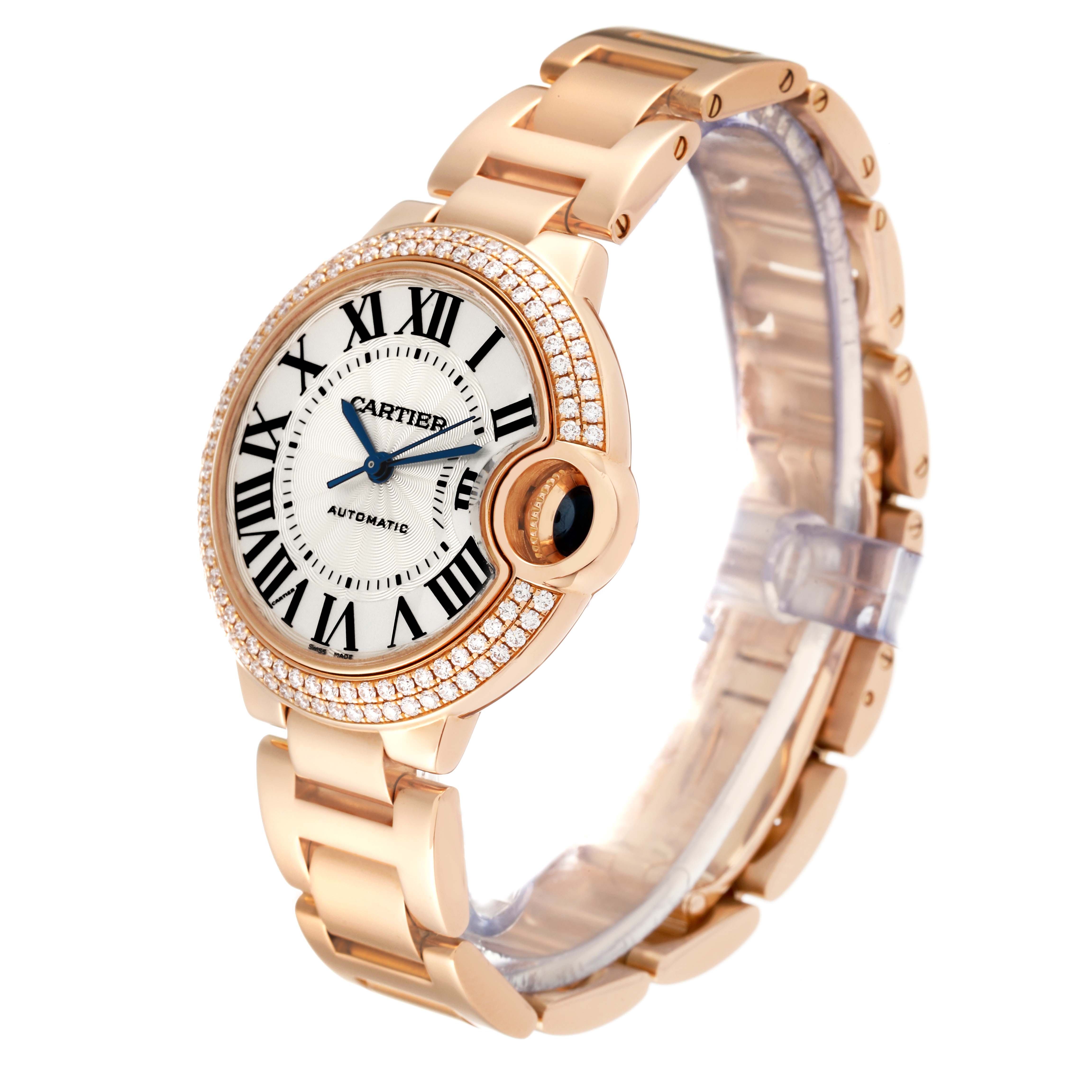 The image shows a three-quarter angled view of a Cartier Ballon Bleu WE902034 Women's Yellow Gold Silver Dial WE902034 Women's Yellow Gold Silver Dial watch, highlighting its face, crown, and bracelet.