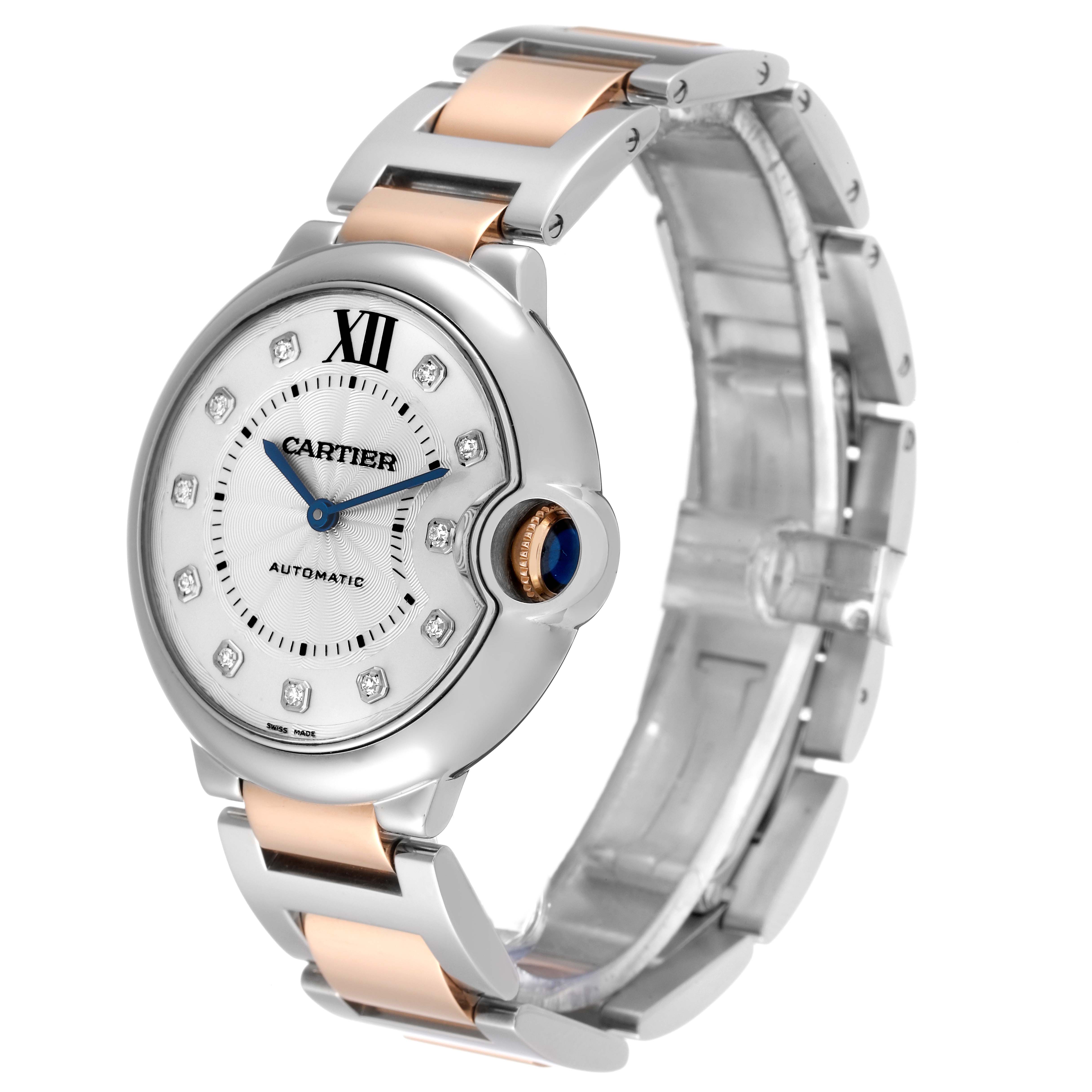 The image shows a Ballon Bleu watch by Cartier angled to display its face, bezel, and two-tone metal bracelet.